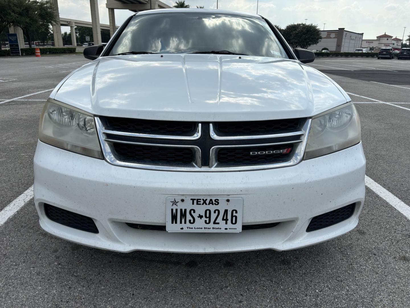 2013 white Dodge Avenger SE (1C3CDZAGXDN) with an 3.6L V6 DOHC 24V FFV engine, 6-Speed Automatic transmission, located at 5005 Telephone Rd., Houston, TX, 77087, (713) 641-0980, 29.690666, -95.298683 - Photo#1