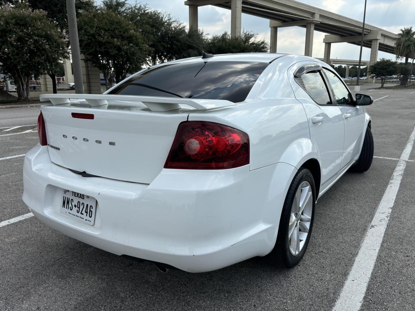 2013 white Dodge Avenger SE (1C3CDZAGXDN) with an 3.6L V6 DOHC 24V FFV engine, 6-Speed Automatic transmission, located at 5005 Telephone Rd., Houston, TX, 77087, (713) 641-0980, 29.690666, -95.298683 - Photo#3