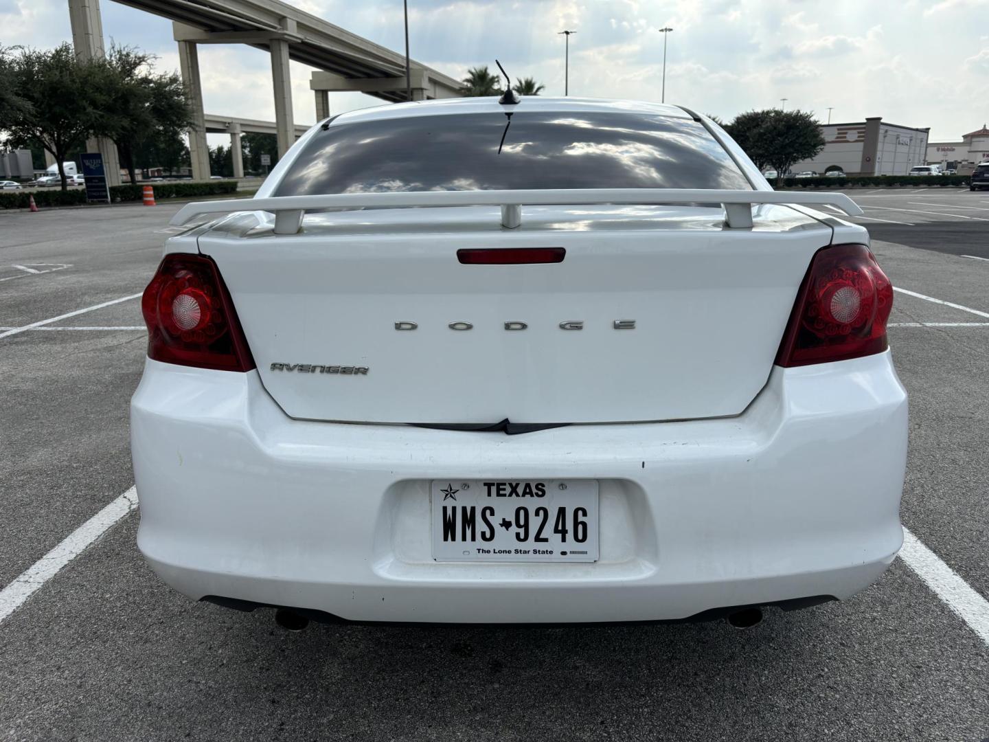 2013 white Dodge Avenger SE (1C3CDZAGXDN) with an 3.6L V6 DOHC 24V FFV engine, 6-Speed Automatic transmission, located at 5005 Telephone Rd., Houston, TX, 77087, (713) 641-0980, 29.690666, -95.298683 - Photo#4