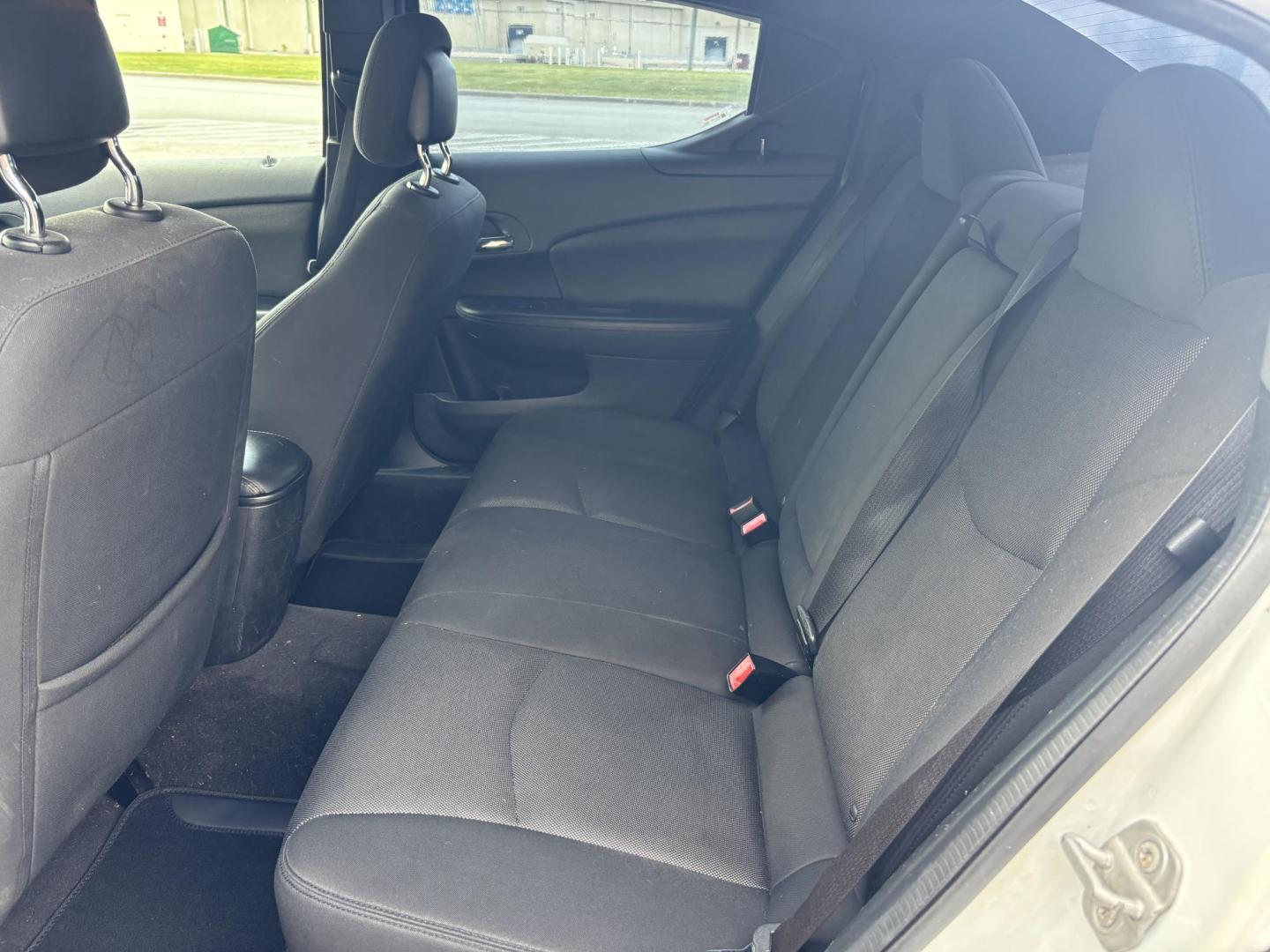 2013 white Dodge Avenger SE (1C3CDZAGXDN) with an 3.6L V6 DOHC 24V FFV engine, 6-Speed Automatic transmission, located at 5005 Telephone Rd., Houston, TX, 77087, (713) 641-0980, 29.690666, -95.298683 - Photo#6