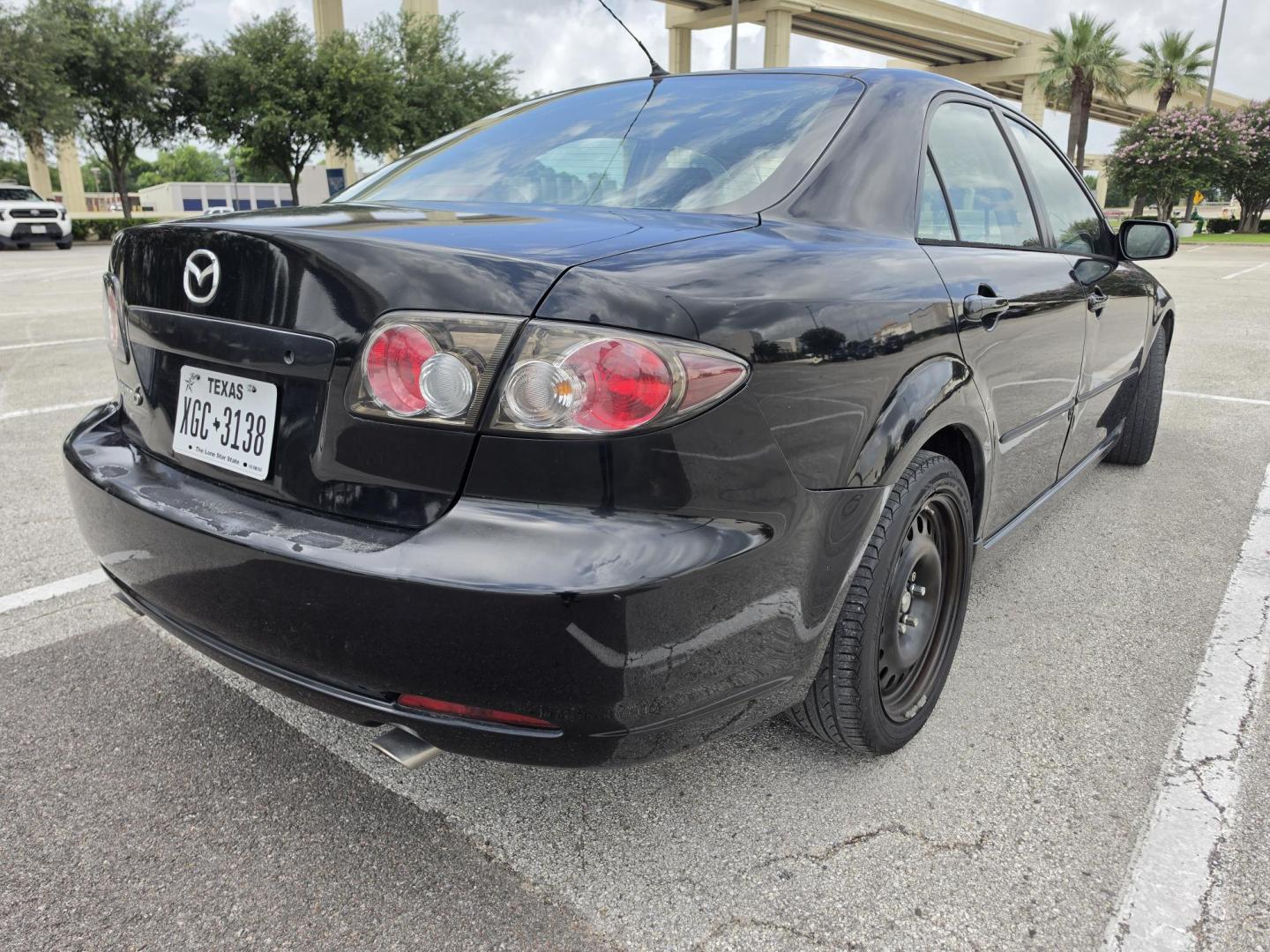 2008 Black Mazda MAZDA6 i Sports Sedan Grand Touring (1YVHP80CX85) with an 2.3L L4 DOHC 16V engine, located at 5005 Telephone Rd., Houston, TX, 77087, (713) 641-0980, 29.690666, -95.298683 - Photo#1