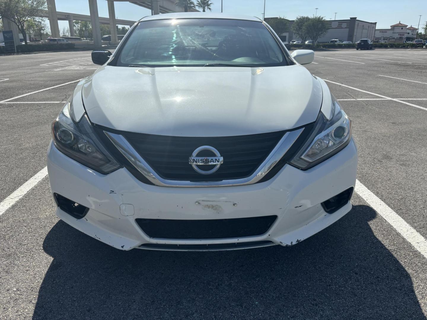 2016 white Nissan Altima 2.5 SL (1N4AL3AP7GN) with an 2.5L L4 DOHC 16V engine, CVT transmission, located at 5005 Telephone Rd., Houston, TX, 77087, (713) 641-0980, 29.690666, -95.298683 - Photo#1
