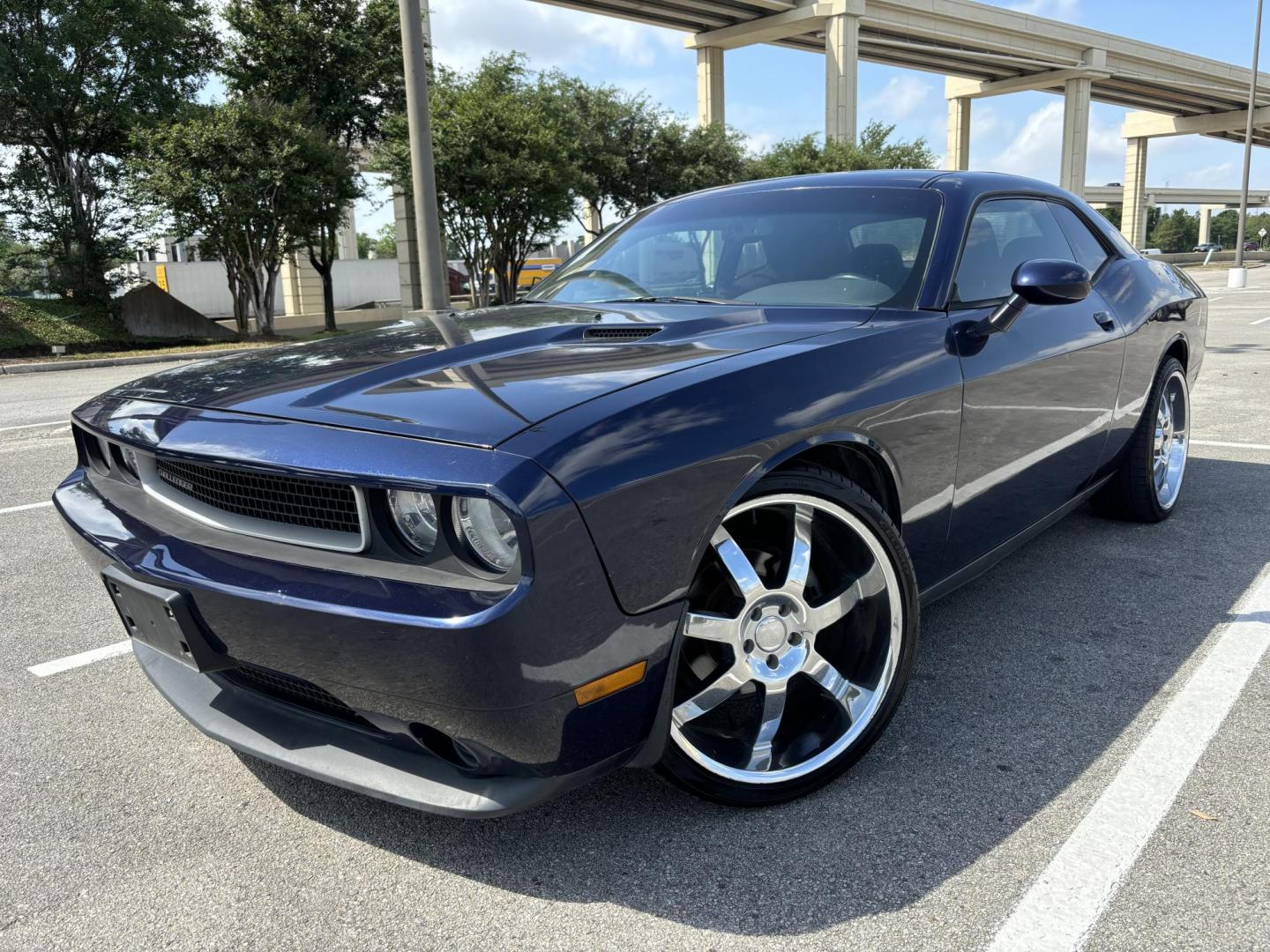 2014 Blue Dodge Challenger SXT (2C3CDYAG5EH) with an 3.6L V6 DOHC 24V engine, 5-Speed Automatic transmission, located at 5005 Telephone Rd., Houston, TX, 77087, (713) 641-0980, 29.690666, -95.298683 - Photo#0