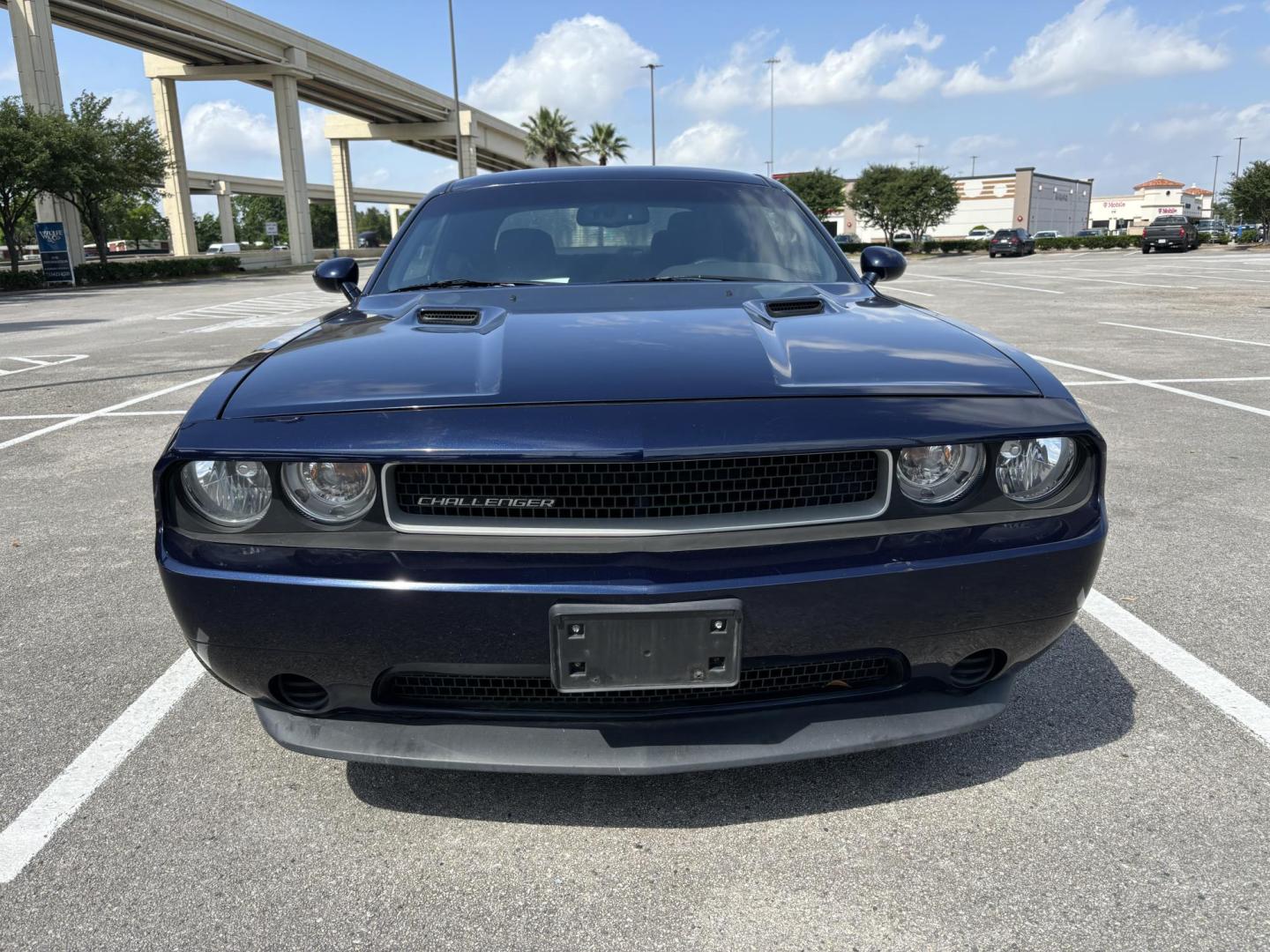 2014 Blue Dodge Challenger SXT (2C3CDYAG5EH) with an 3.6L V6 DOHC 24V engine, 5-Speed Automatic transmission, located at 5005 Telephone Rd., Houston, TX, 77087, (713) 641-0980, 29.690666, -95.298683 - Photo#1