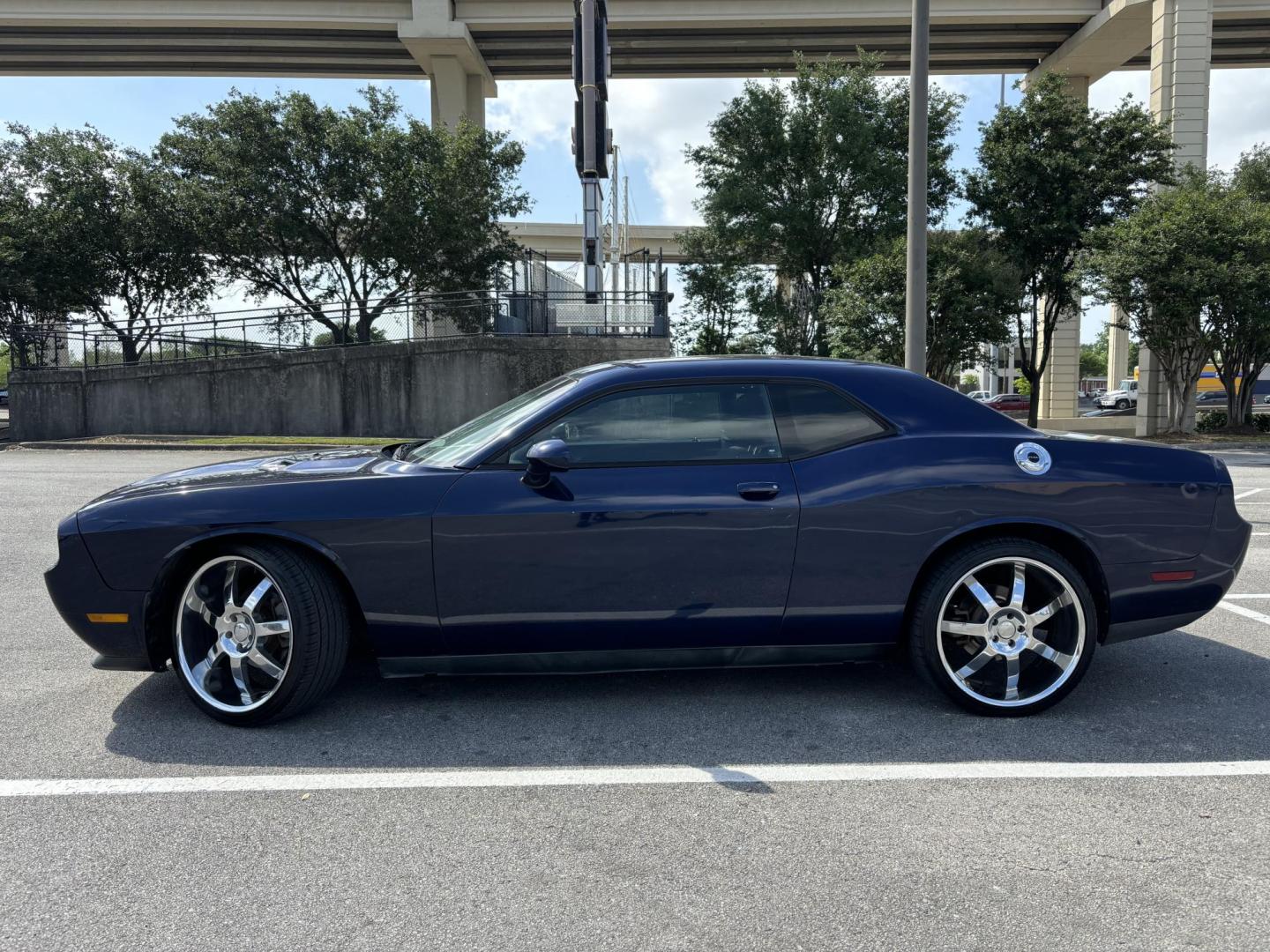 2014 Blue Dodge Challenger SXT (2C3CDYAG5EH) with an 3.6L V6 DOHC 24V engine, 5-Speed Automatic transmission, located at 5005 Telephone Rd., Houston, TX, 77087, (713) 641-0980, 29.690666, -95.298683 - Photo#2
