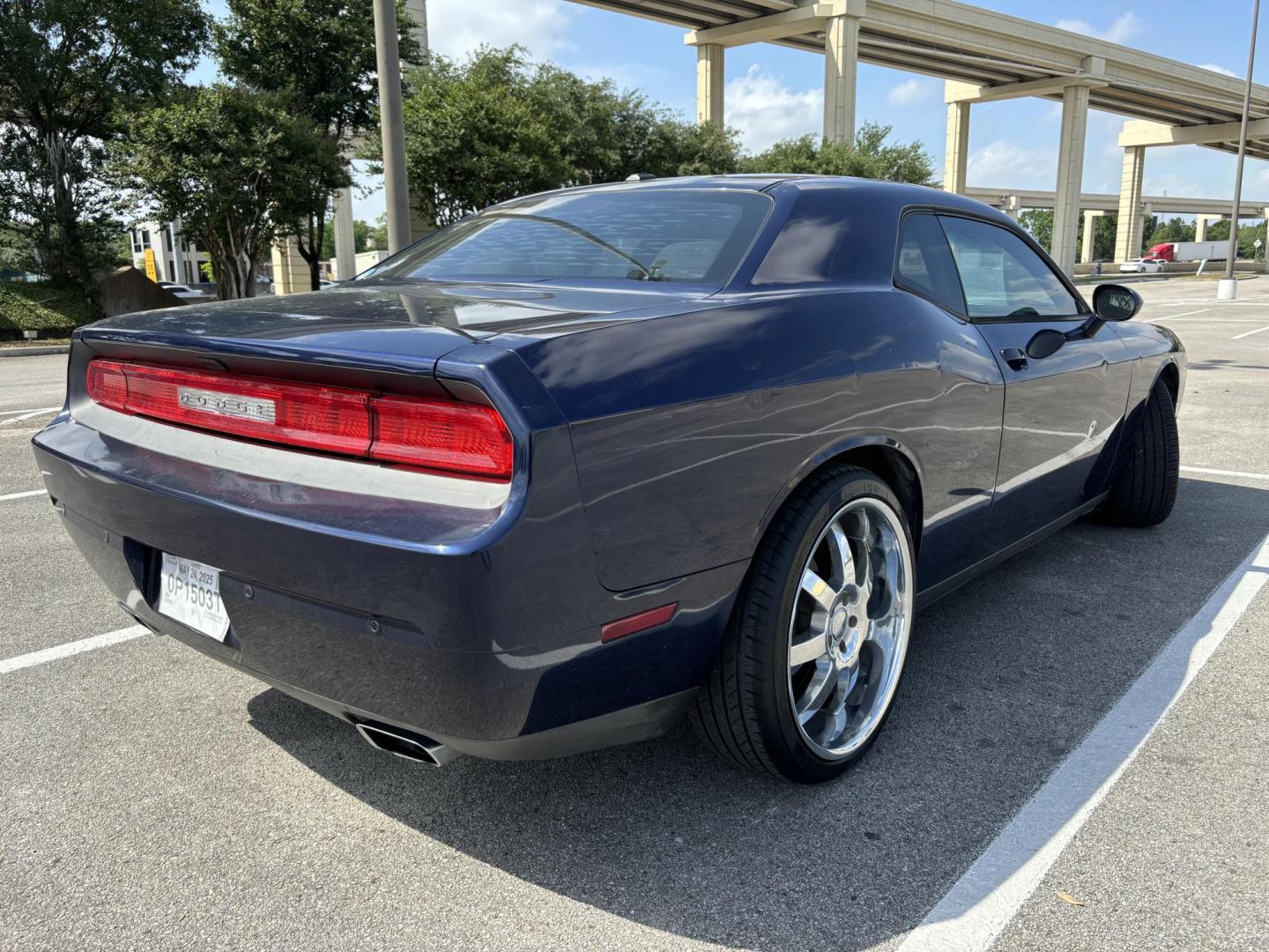 2014 Blue Dodge Challenger SXT (2C3CDYAG5EH) with an 3.6L V6 DOHC 24V engine, 5-Speed Automatic transmission, located at 5005 Telephone Rd., Houston, TX, 77087, (713) 641-0980, 29.690666, -95.298683 - Photo#4