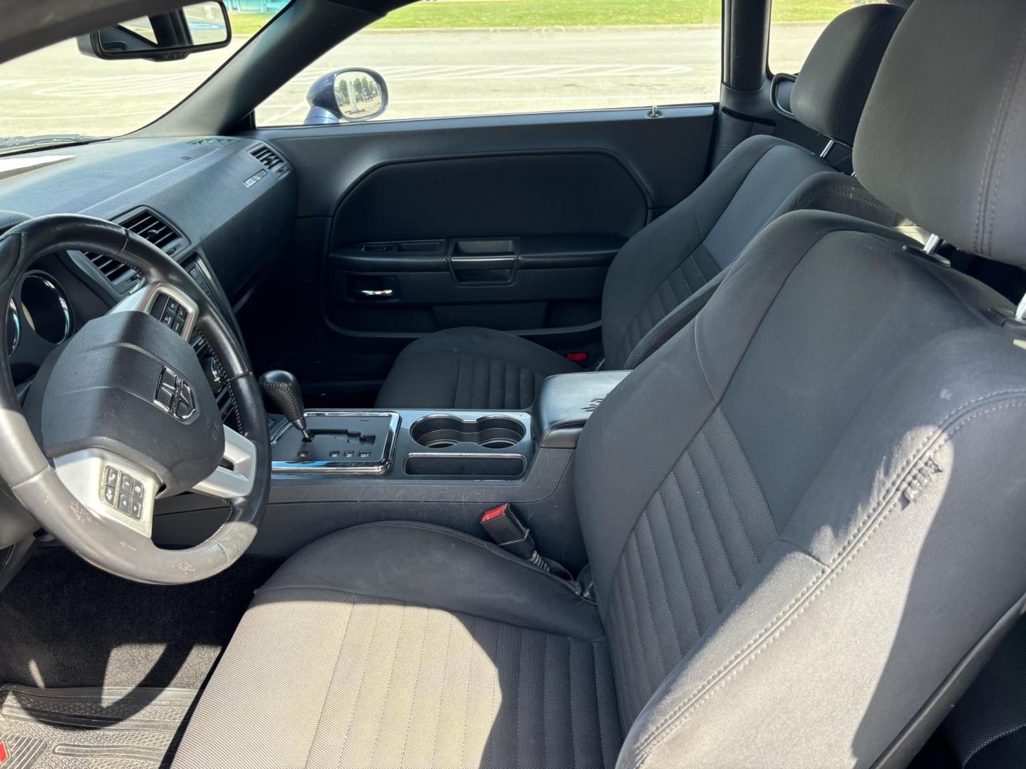 2014 Blue Dodge Challenger SXT (2C3CDYAG5EH) with an 3.6L V6 DOHC 24V engine, 5-Speed Automatic transmission, located at 5005 Telephone Rd., Houston, TX, 77087, (713) 641-0980, 29.690666, -95.298683 - Photo#7