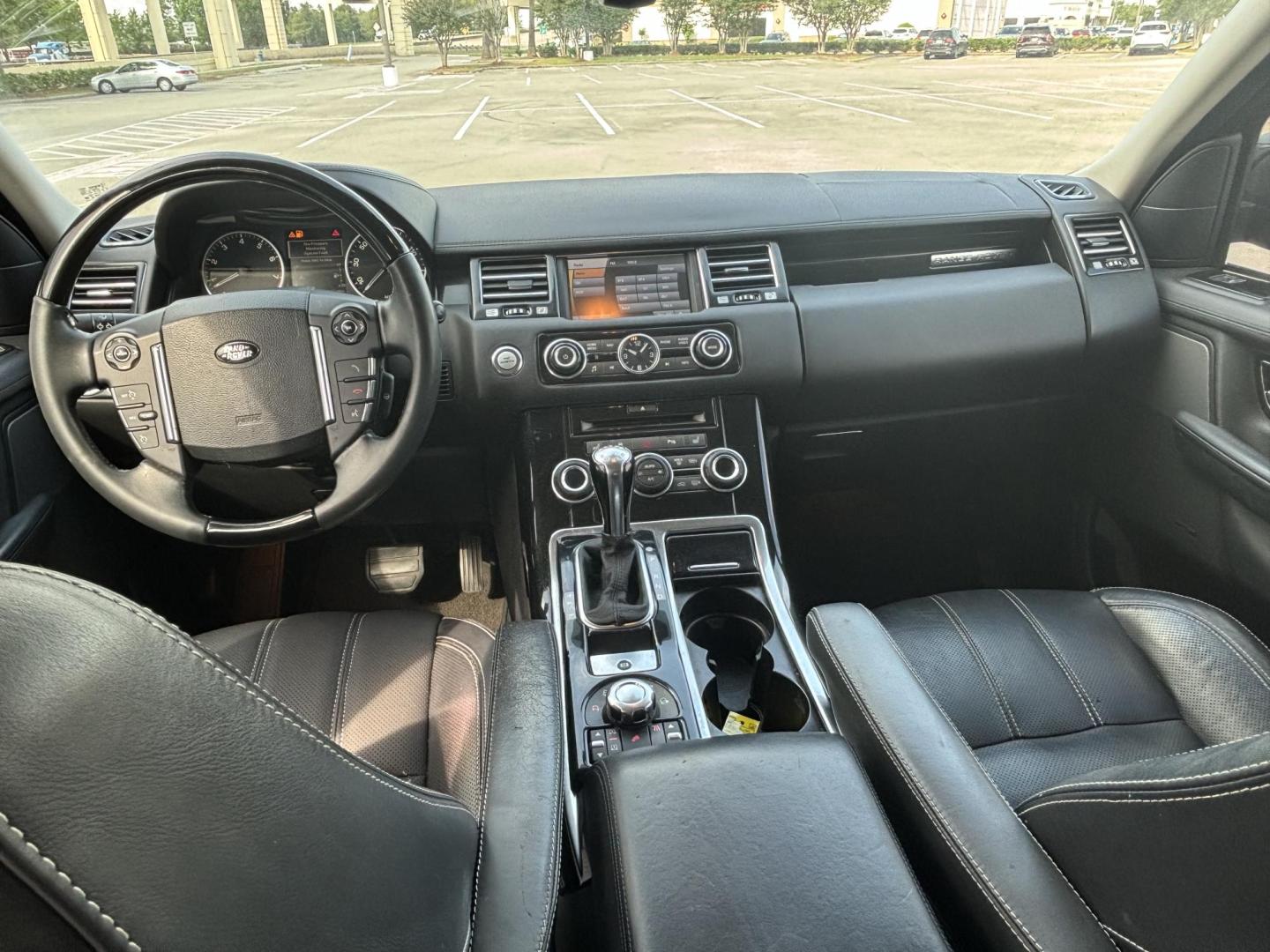 2011 Black Land Rover Range Rover Sport HSE (SALSK2D48BA) with an 4.4L V8 DOHC 32V engine, 6-Speed Automatic transmission, located at 5005 Telephone Rd., Houston, TX, 77087, (713) 641-0980, 29.690666, -95.298683- Photo#9