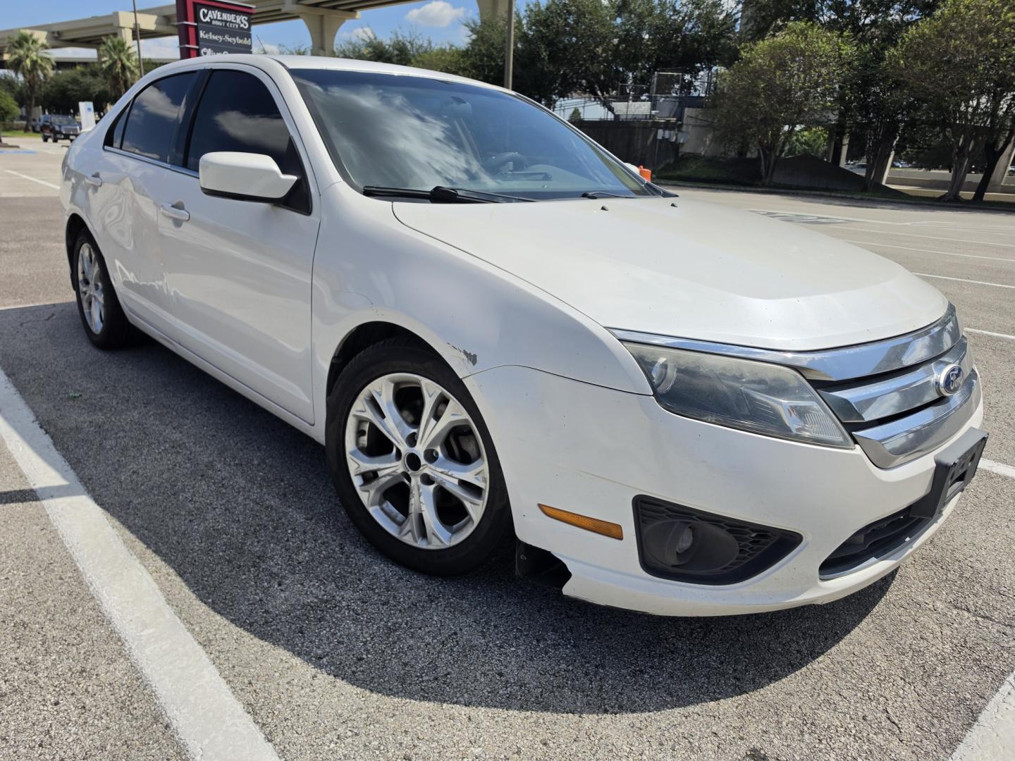 2012 white Ford Fusion SE (3FAHP0HA0CR) with an 2.5L L4 DOHC 16V engine, located at 5005 Telephone Rd., Houston, TX, 77087, (713) 641-0980, 29.690666, -95.298683- Photo#3