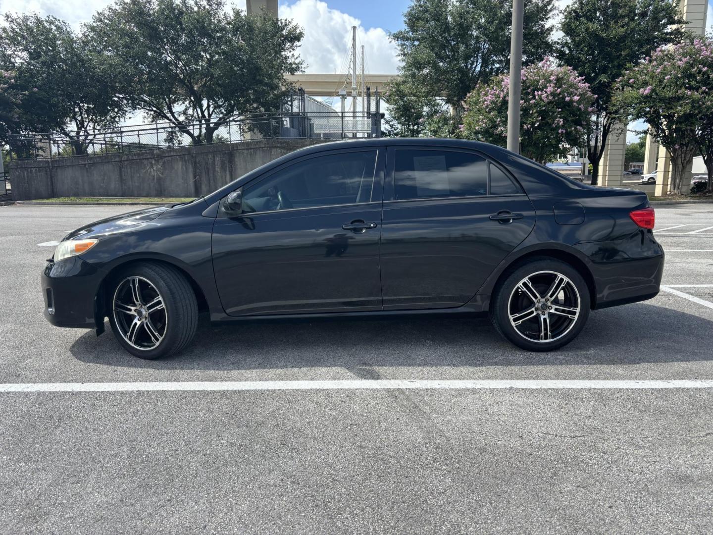 2013 Black Toyota Corolla LE 4-Speed AT (5YFBU4EE5DP) with an 1.8L L4 DOHC 16V engine, 4-Speed Automatic transmission, located at 5005 Telephone Rd., Houston, TX, 77087, (713) 641-0980, 29.690666, -95.298683 - Photo#2