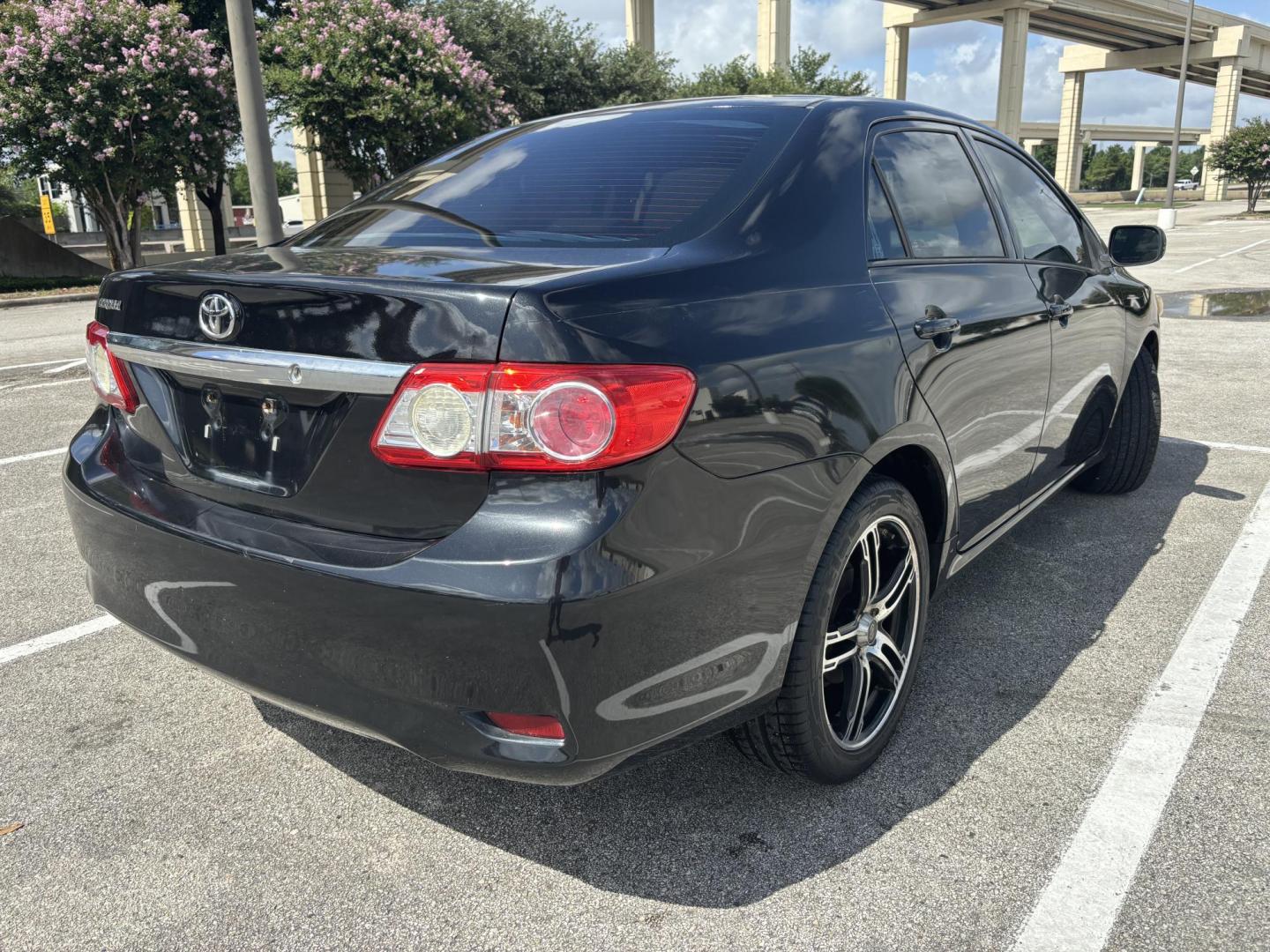 2013 Black Toyota Corolla LE 4-Speed AT (5YFBU4EE5DP) with an 1.8L L4 DOHC 16V engine, 4-Speed Automatic transmission, located at 5005 Telephone Rd., Houston, TX, 77087, (713) 641-0980, 29.690666, -95.298683 - Photo#4