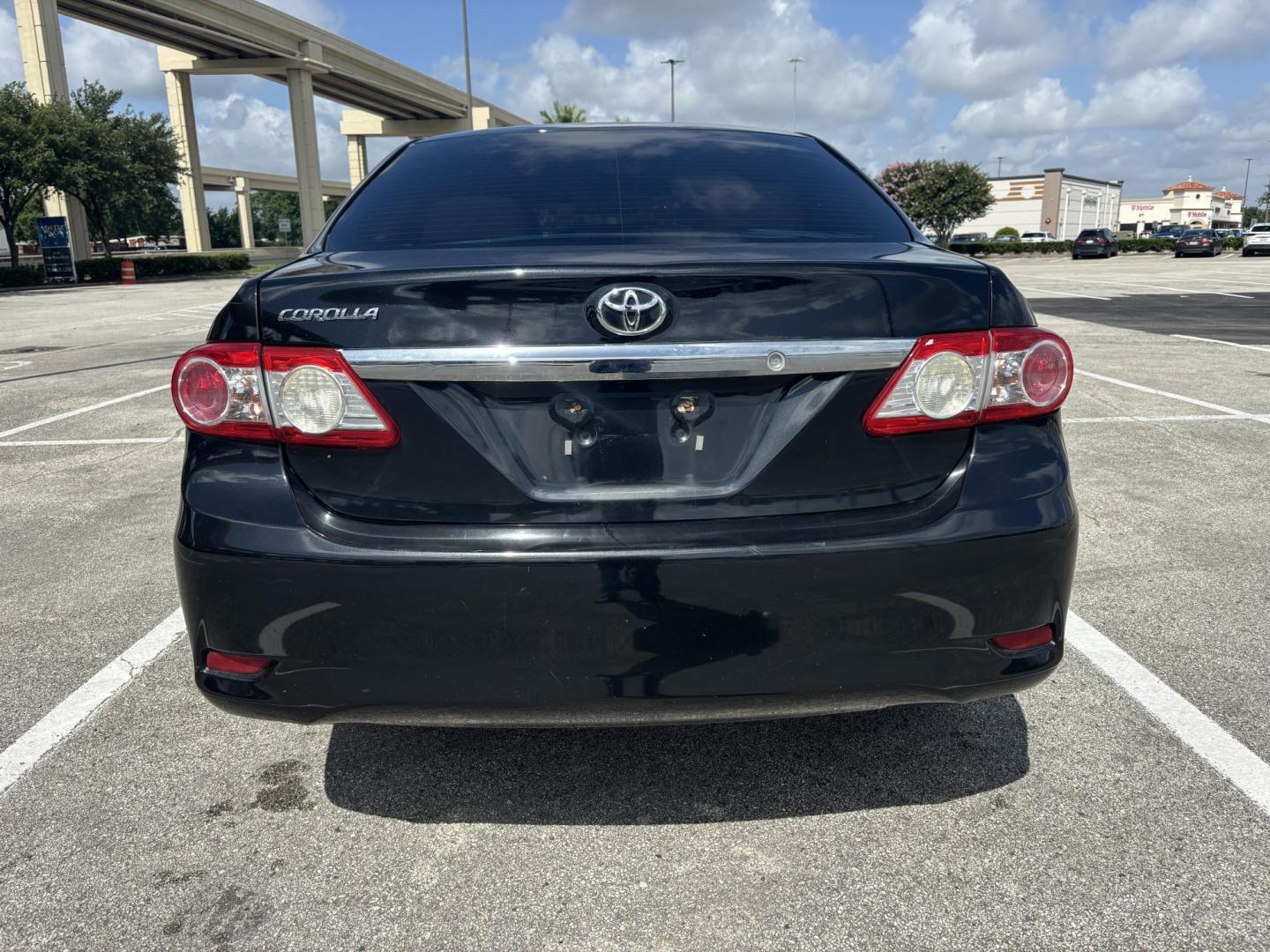 2013 Black Toyota Corolla LE 4-Speed AT (5YFBU4EE5DP) with an 1.8L L4 DOHC 16V engine, 4-Speed Automatic transmission, located at 5005 Telephone Rd., Houston, TX, 77087, (713) 641-0980, 29.690666, -95.298683 - Photo#3