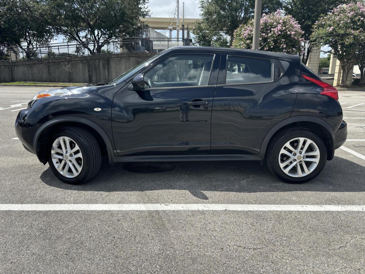 2014 Black Nissan Juke S FWD (JN8AF5MR9ET) with an 1.6L L4 DOHC 16V engine, Continuously Variable Transmission transmission, located at 5005 Telephone Rd., Houston, TX, 77087, (713) 641-0980, 29.690666, -95.298683 - Photo#2