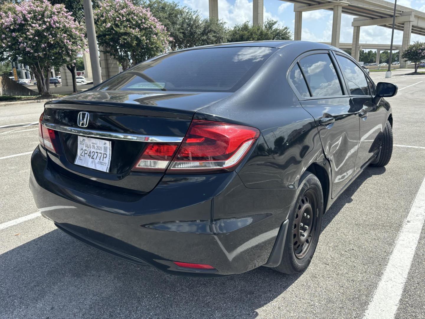 2015 Black Honda Civic LX Sedan CVT (2HGFB2F52FH) with an 1.8L L4 SOHC 16V engine, Continuously Variable Transmission transmission, located at 5005 Telephone Rd., Houston, TX, 77087, (713) 641-0980, 29.690666, -95.298683 - Photo#4
