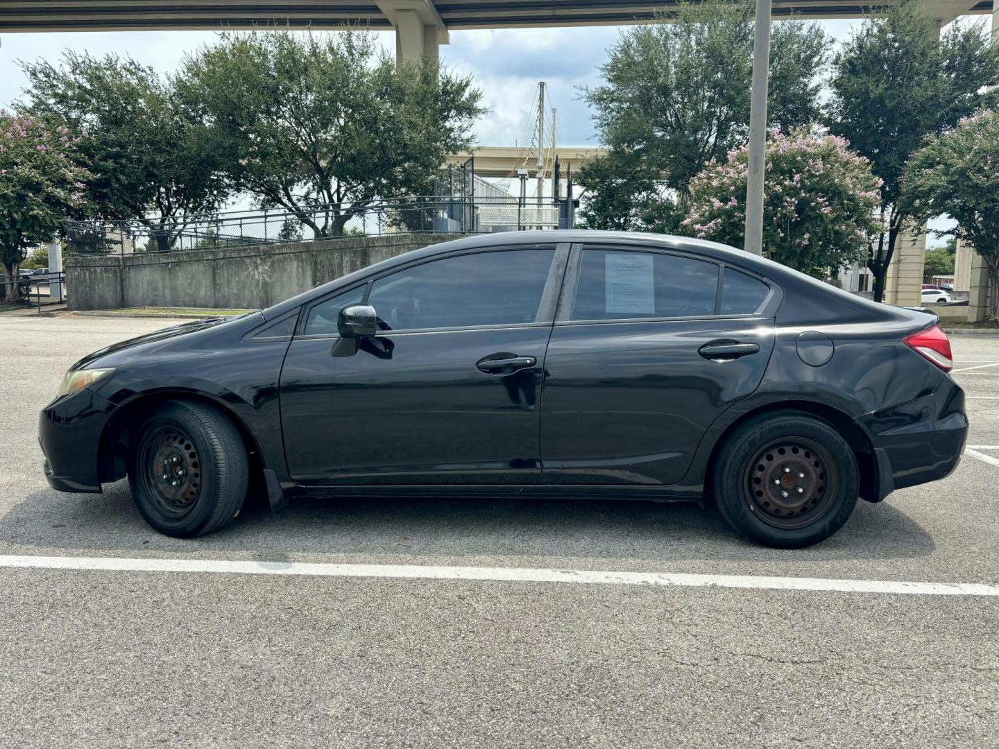 2015 Black Honda Civic LX Sedan CVT (2HGFB2F52FH) with an 1.8L L4 SOHC 16V engine, Continuously Variable Transmission transmission, located at 5005 Telephone Rd., Houston, TX, 77087, (713) 641-0980, 29.690666, -95.298683 - Photo#2