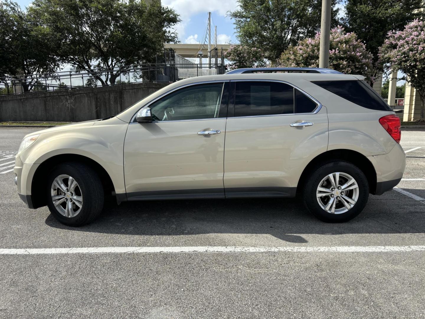 2012 Tan Chevrolet Equinox LTZ AWD (2GNFLGEK7C6) with an 2.4L L4 DOHC 16V engine, 6-Speed Automatic transmission, located at 5005 Telephone Rd., Houston, TX, 77087, (713) 641-0980, 29.690666, -95.298683 - Photo#2