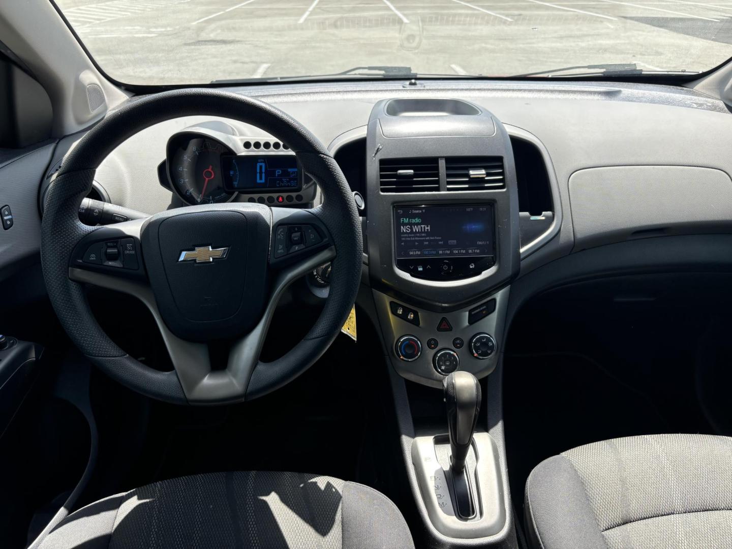 2014 Red Chevrolet Sonic LT Auto Sedan (1G1JC5SH5E4) with an 1.8L L4 DOHC 24V engine, 6-Speed Automatic transmission, located at 5005 Telephone Rd., Houston, TX, 77087, (713) 641-0980, 29.690666, -95.298683 - Photo#8