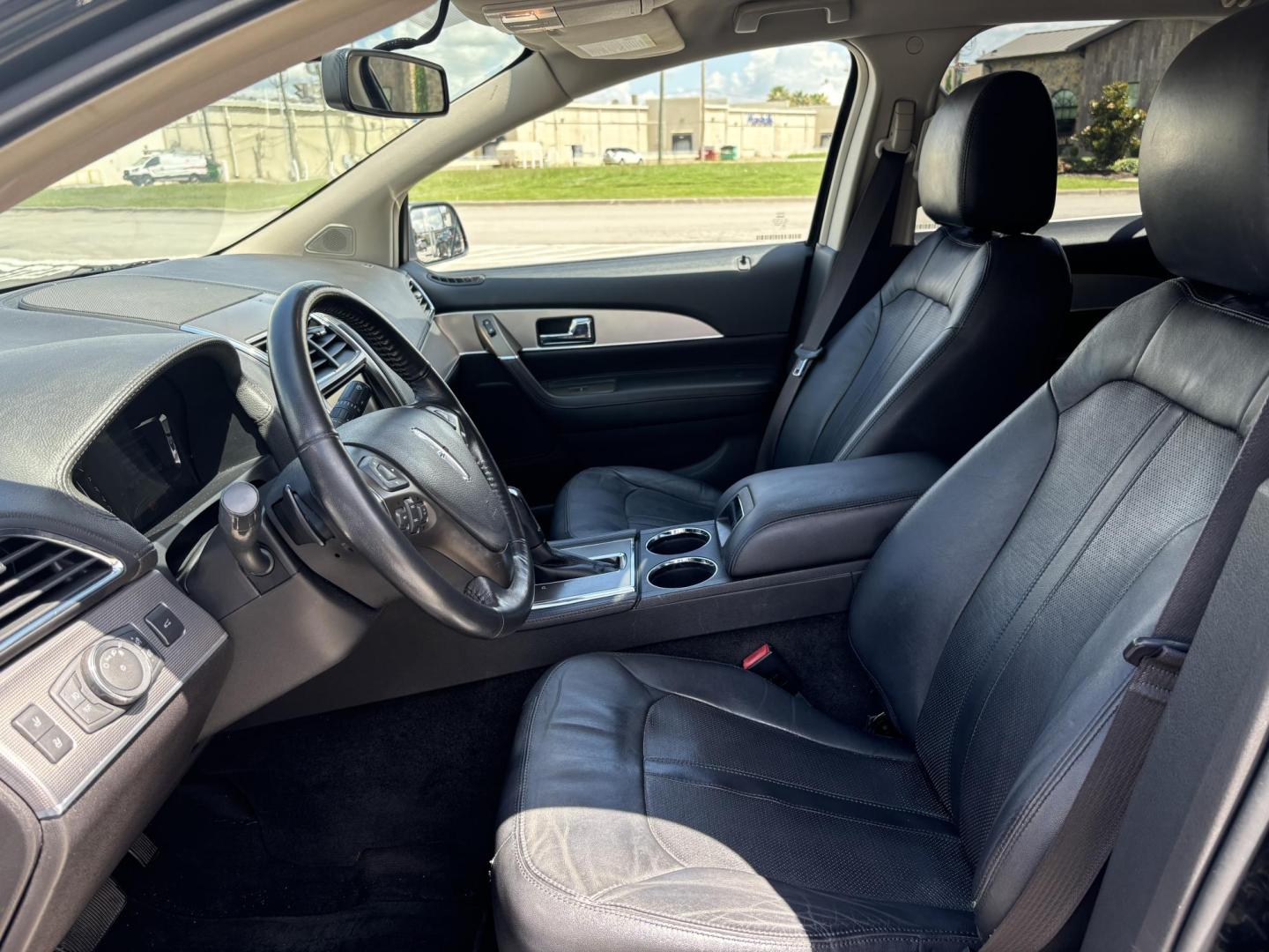 2013 Black Lincoln MKX FWD (2LMDJ6JK3DB) with an 3.7L V6 DOHC 24V engine, 6-Speed Automatic transmission, located at 5005 Telephone Rd., Houston, TX, 77087, (713) 641-0980, 29.690666, -95.298683 - Photo#7