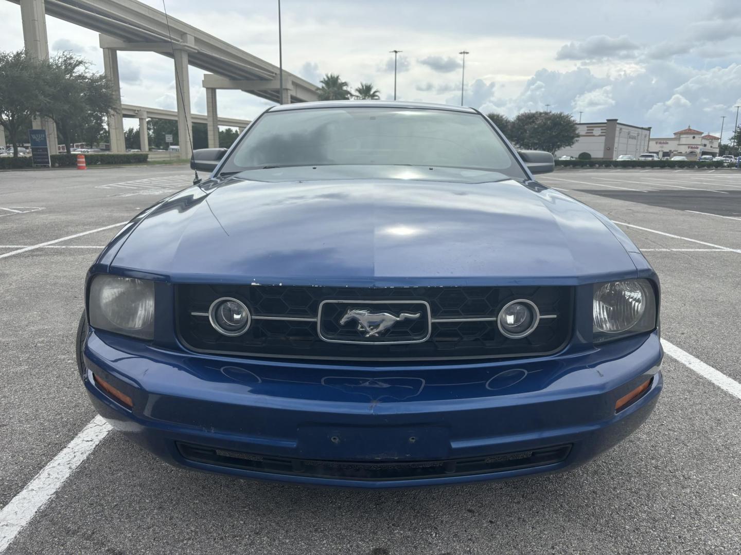 2006 Blue Ford Mustang V6 Deluxe Coupe (1ZVFT80NX65) with an 4.0L V6 SOHC 12V engine, located at 5005 Telephone Rd., Houston, TX, 77087, (713) 641-0980, 29.690666, -95.298683 - Photo#1