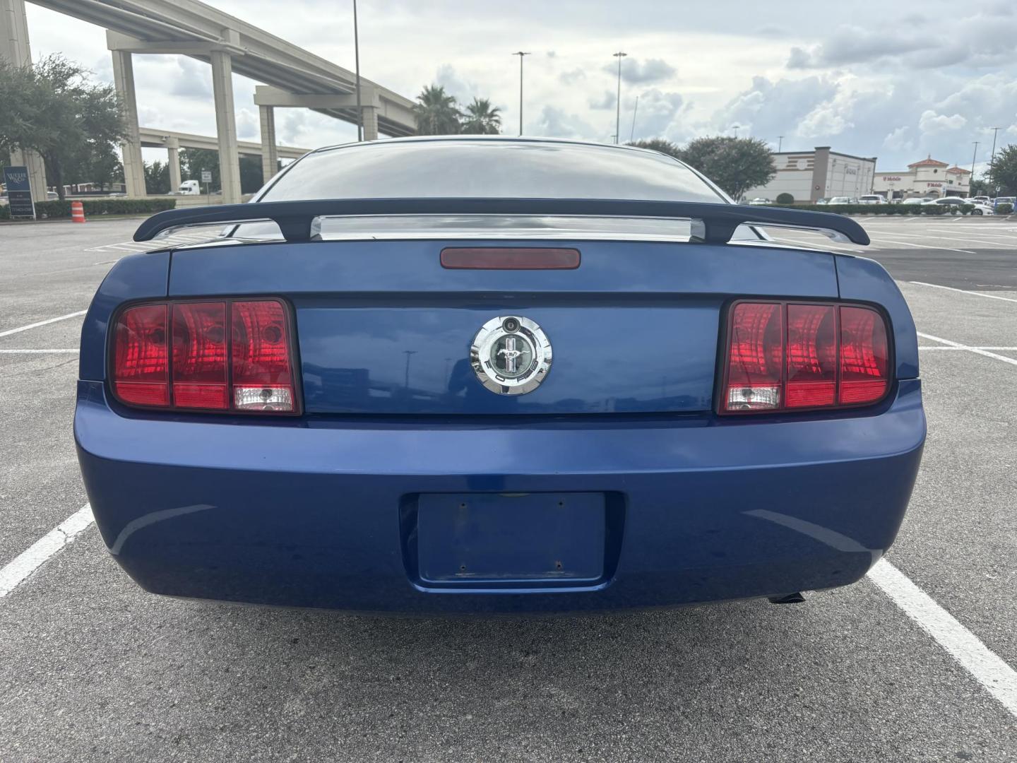 2006 Blue Ford Mustang V6 Deluxe Coupe (1ZVFT80NX65) with an 4.0L V6 SOHC 12V engine, located at 5005 Telephone Rd., Houston, TX, 77087, (713) 641-0980, 29.690666, -95.298683 - Photo#3