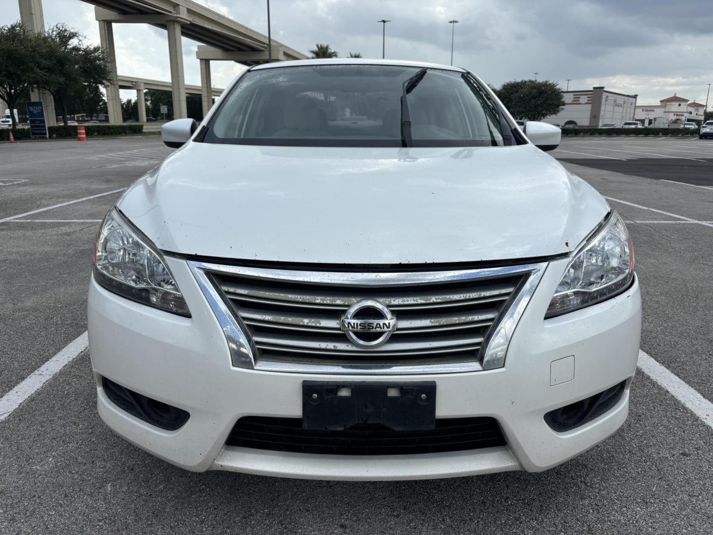 2013 White Nissan Sentra S 6MT (3N1AB7AP8DL) with an 2.0L L4 DOHC 16V engine, 6-Speed Manual transmission, located at 5005 Telephone Rd., Houston, TX, 77087, (713) 641-0980, 29.690666, -95.298683 - Photo#1