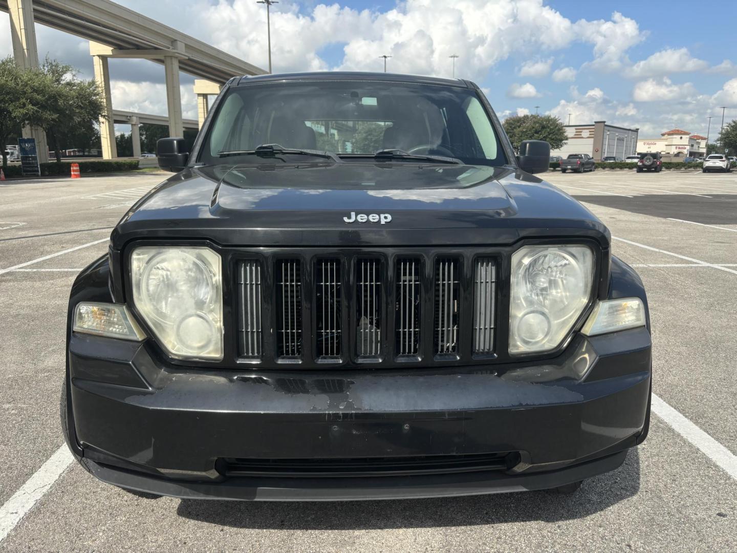 2012 Black Jeep Liberty Sport 2WD (1C4PJLAK2CW) with an 3.7L V6 SOHC 12V engine, 4-Speed Automatic transmission, located at 5005 Telephone Rd., Houston, TX, 77087, (713) 641-0980, 29.690666, -95.298683 - Photo#1