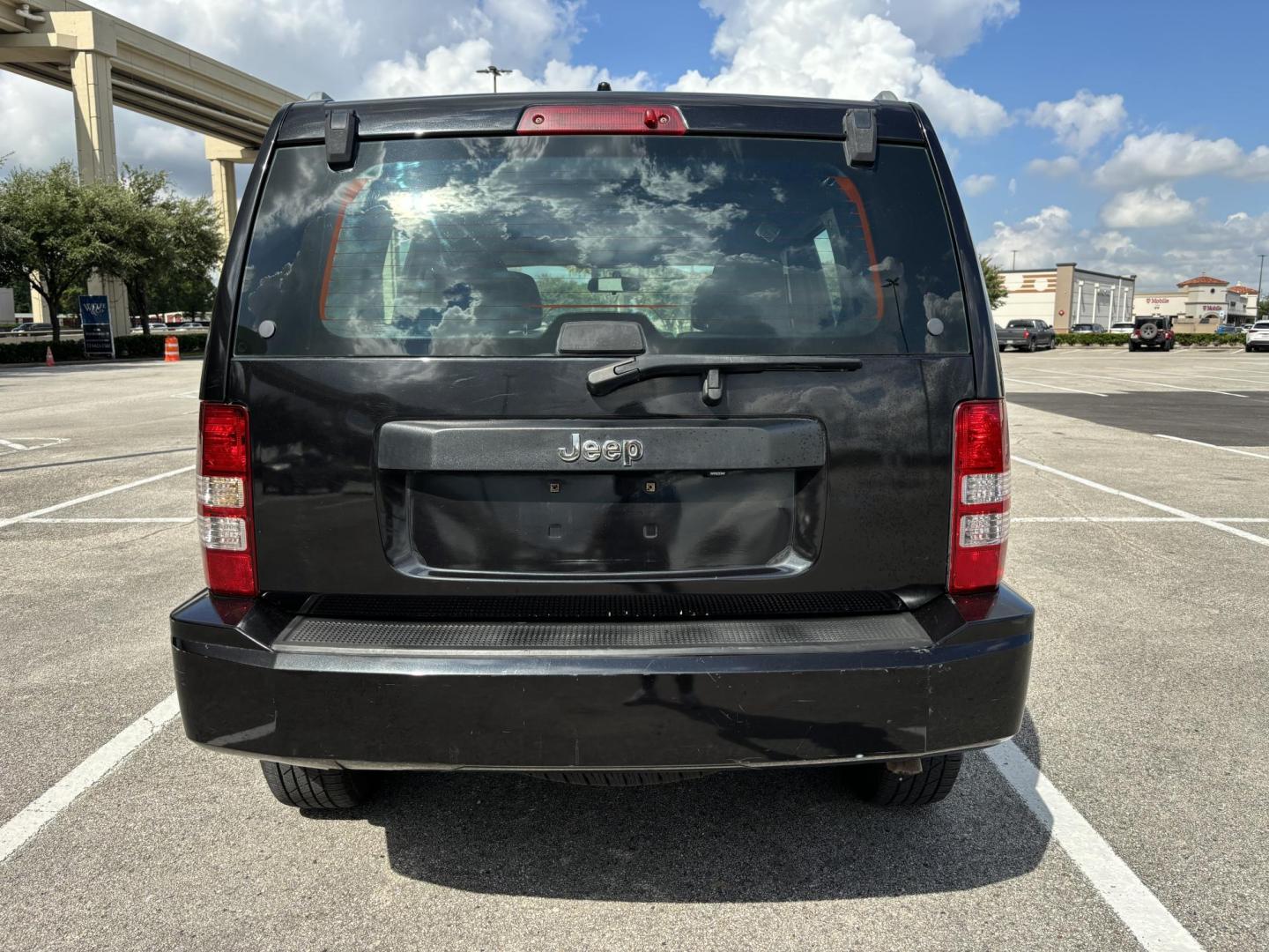 2012 Black Jeep Liberty Sport 2WD (1C4PJLAK2CW) with an 3.7L V6 SOHC 12V engine, 4-Speed Automatic transmission, located at 5005 Telephone Rd., Houston, TX, 77087, (713) 641-0980, 29.690666, -95.298683 - Photo#3