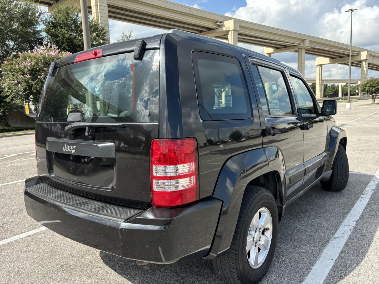 2012 Black Jeep Liberty Sport 2WD (1C4PJLAK2CW) with an 3.7L V6 SOHC 12V engine, 4-Speed Automatic transmission, located at 5005 Telephone Rd., Houston, TX, 77087, (713) 641-0980, 29.690666, -95.298683 - Photo#4