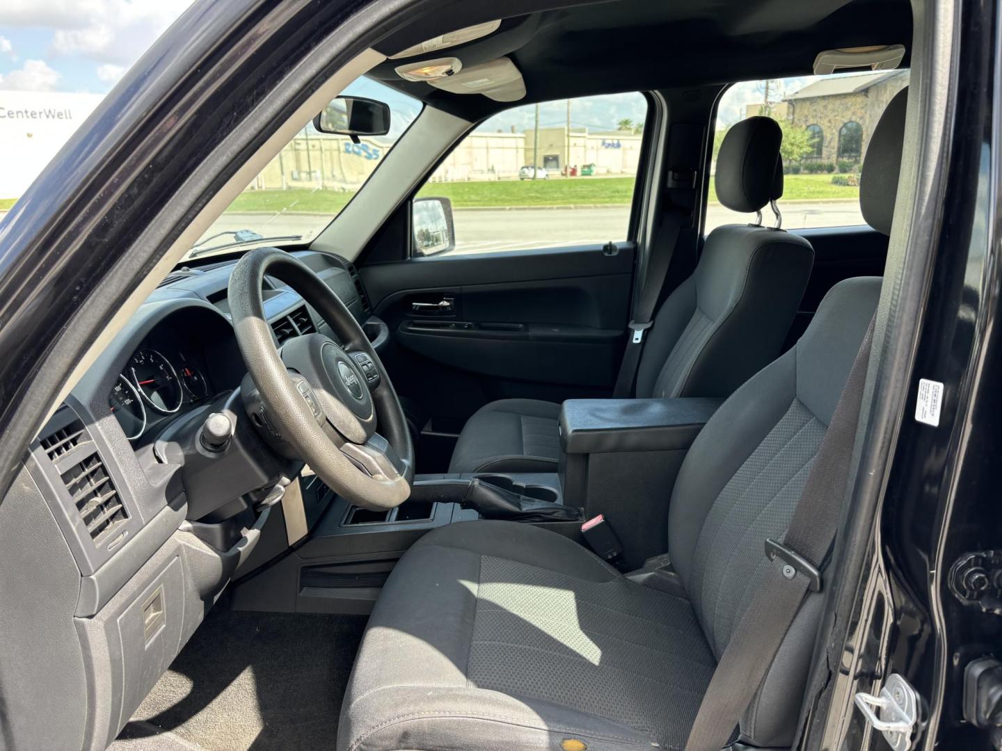 2012 Black Jeep Liberty Sport 2WD (1C4PJLAK2CW) with an 3.7L V6 SOHC 12V engine, 4-Speed Automatic transmission, located at 5005 Telephone Rd., Houston, TX, 77087, (713) 641-0980, 29.690666, -95.298683 - Photo#7