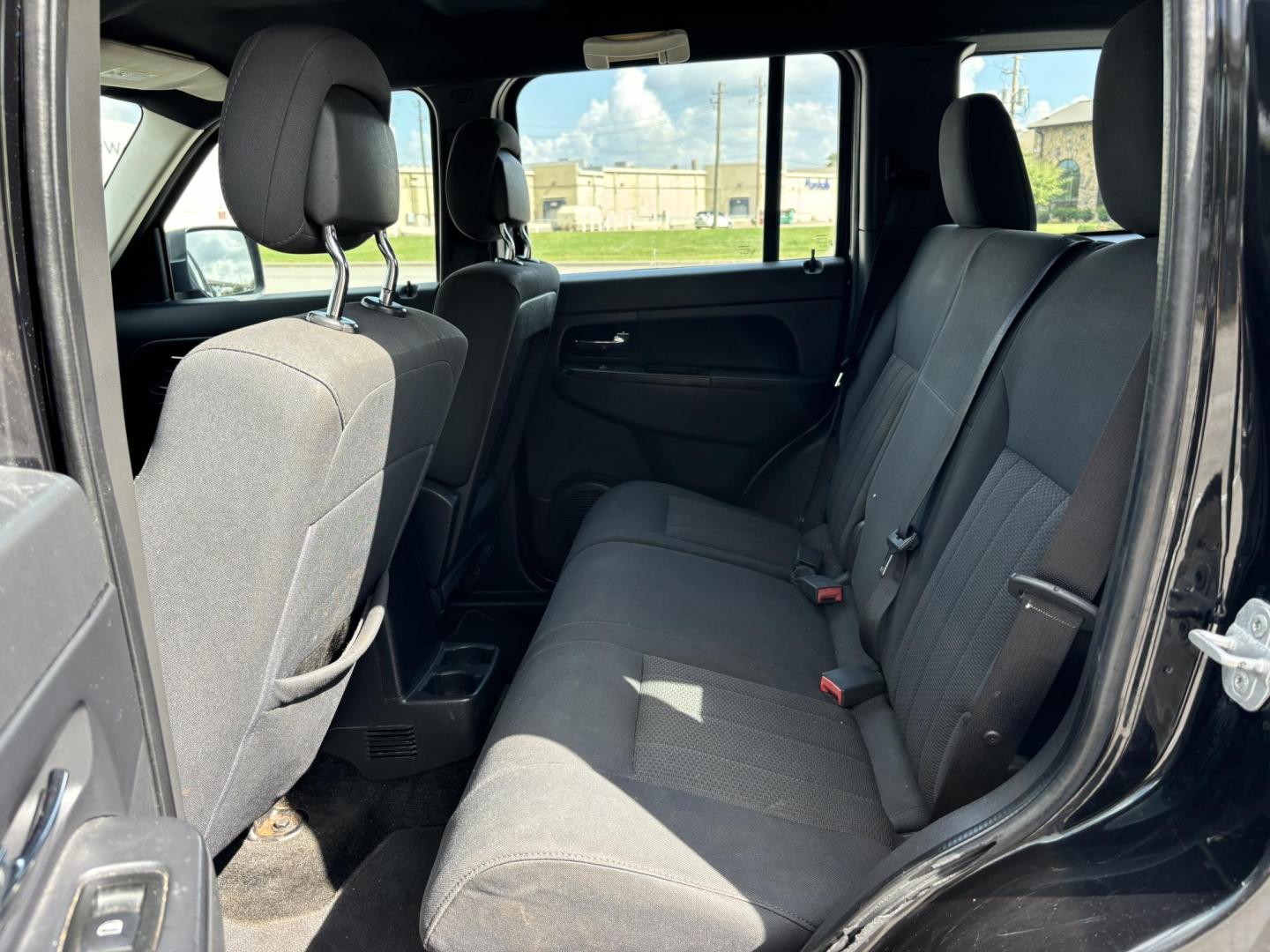 2012 Black Jeep Liberty Sport 2WD (1C4PJLAK2CW) with an 3.7L V6 SOHC 12V engine, 4-Speed Automatic transmission, located at 5005 Telephone Rd., Houston, TX, 77087, (713) 641-0980, 29.690666, -95.298683 - Photo#6
