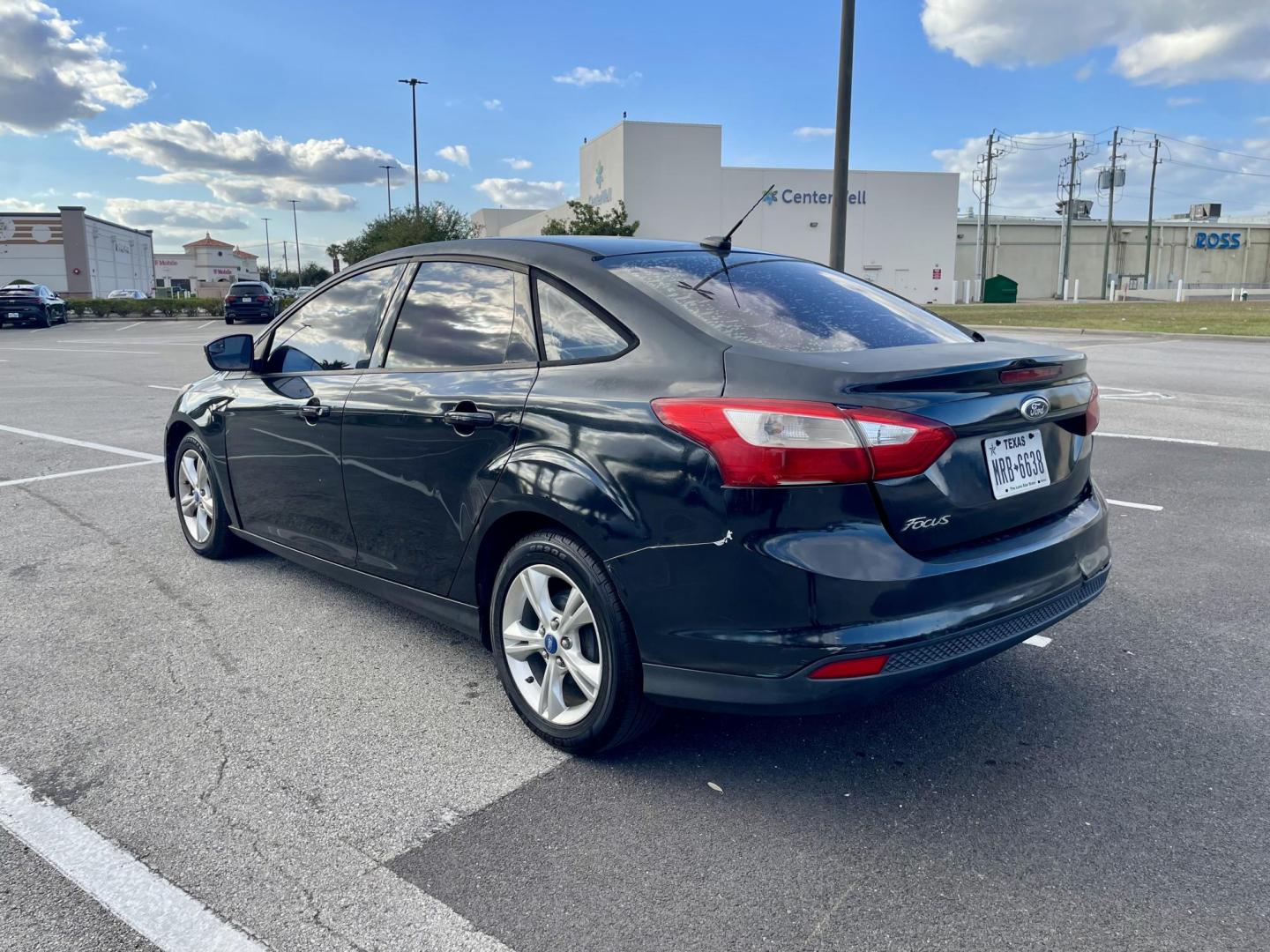 2013 Black Ford Focus SE Sedan (1FADP3F23DL) with an 2.0L L4 DOHC 16V engine, located at 5005 Telephone Rd., Houston, TX, 77087, (713) 641-0980, 29.690666, -95.298683 - Photo#1
