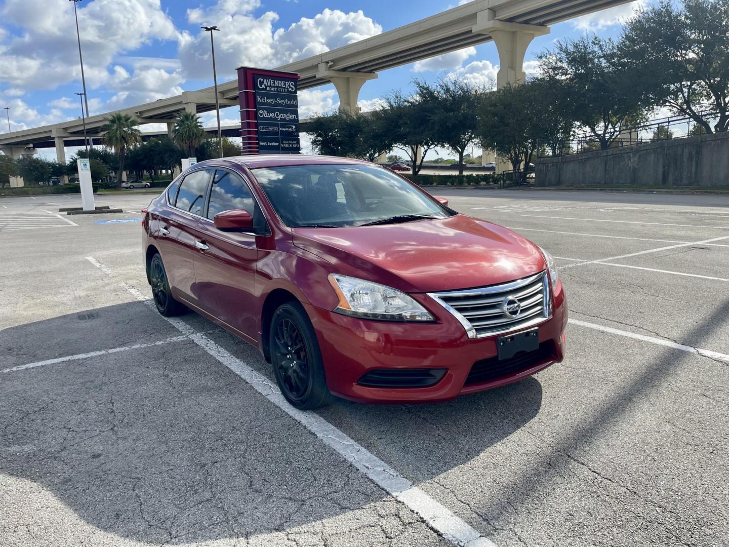 2015 Red Nissan Sentra S 6MT (3N1AB7AP8FL) with an 1.8L L4 SFI DOHC 16V engine, 6-Speed Manual transmission, located at 5005 Telephone Rd., Houston, TX, 77087, (713) 641-0980, 29.690666, -95.298683 - Photo#2