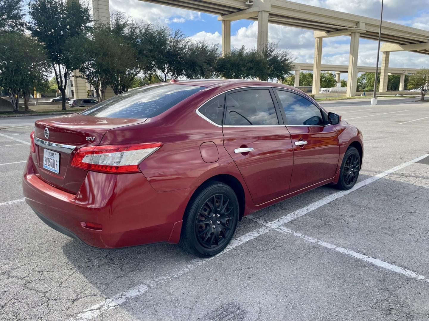 2015 Red Nissan Sentra S 6MT (3N1AB7AP8FL) with an 1.8L L4 SFI DOHC 16V engine, 6-Speed Manual transmission, located at 5005 Telephone Rd., Houston, TX, 77087, (713) 641-0980, 29.690666, -95.298683 - Photo#1
