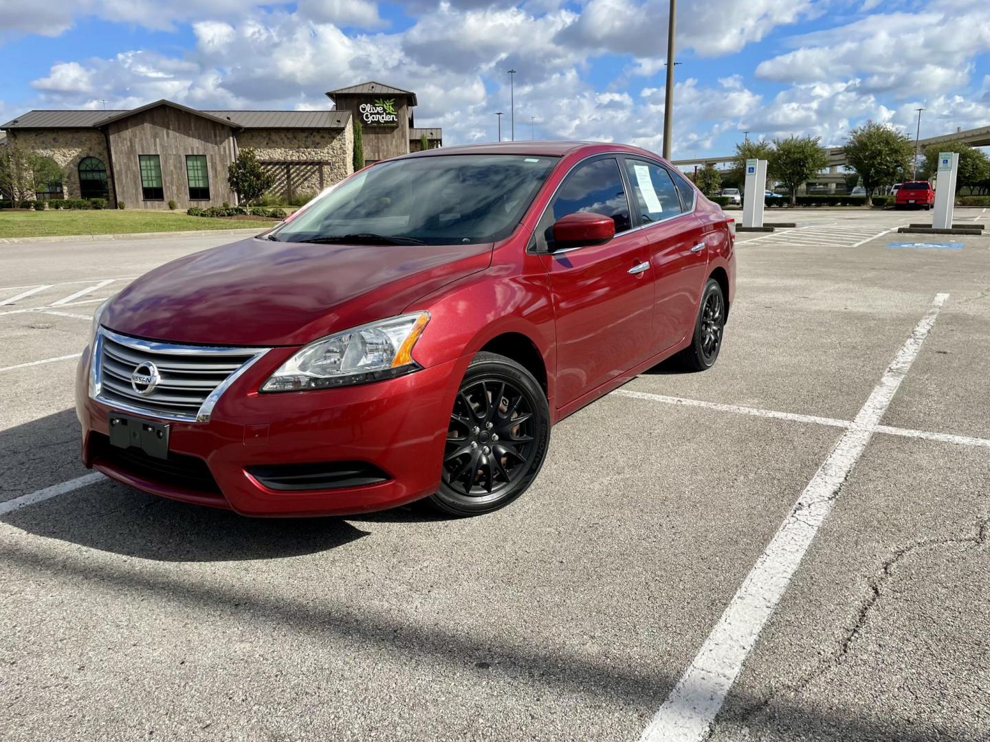 2015 Red Nissan Sentra S 6MT (3N1AB7AP8FL) with an 1.8L L4 SFI DOHC 16V engine, 6-Speed Manual transmission, located at 5005 Telephone Rd., Houston, TX, 77087, (713) 641-0980, 29.690666, -95.298683 - Photo#0