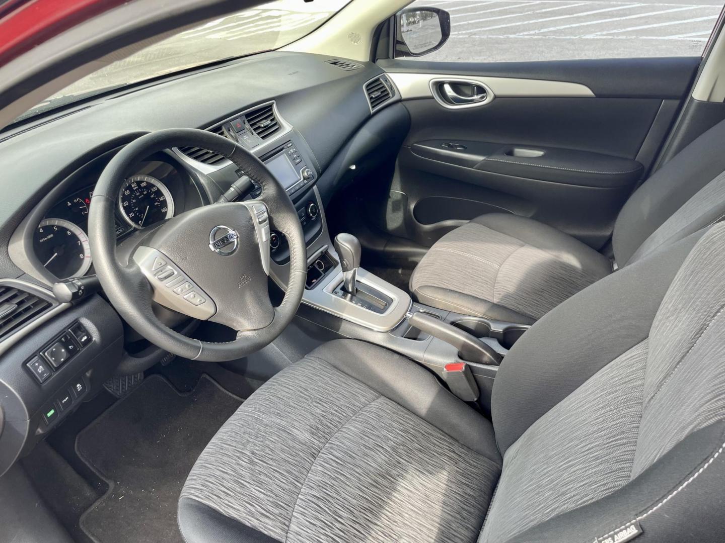 2015 Red Nissan Sentra S 6MT (3N1AB7AP8FL) with an 1.8L L4 SFI DOHC 16V engine, 6-Speed Manual transmission, located at 5005 Telephone Rd., Houston, TX, 77087, (713) 641-0980, 29.690666, -95.298683 - Photo#3