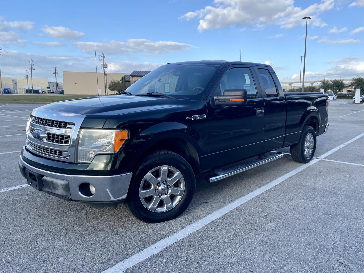 2013 Green Ford F-150 XLT SuperCab 8-ft. Bed 2WD (1FTEX1CM8DK) with an 3.7L V6 DOHC 24V engine, 6-Speed Automatic transmission, located at 5005 Telephone Rd., Houston, TX, 77087, (713) 641-0980, 29.690666, -95.298683 - Photo#0