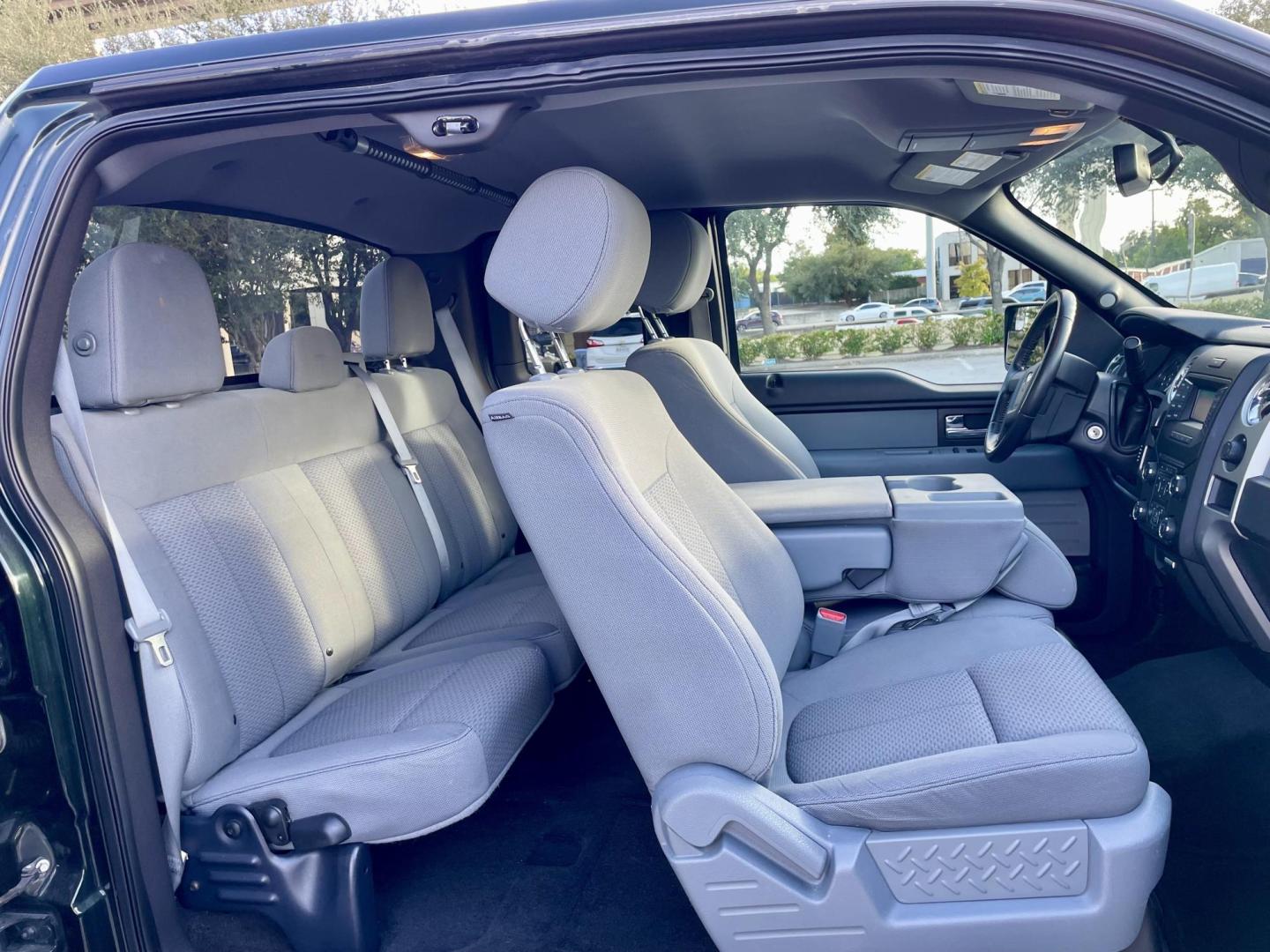 2013 Green Ford F-150 XLT SuperCab 8-ft. Bed 2WD (1FTEX1CM8DK) with an 3.7L V6 DOHC 24V engine, 6-Speed Automatic transmission, located at 5005 Telephone Rd., Houston, TX, 77087, (713) 641-0980, 29.690666, -95.298683 - Photo#3