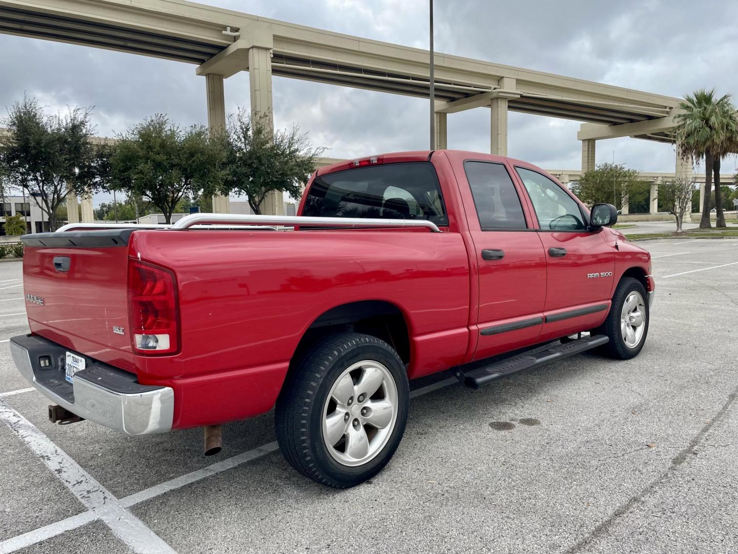 2003 Red Dodge Ram 1500 Laramie Quad Cab Long Bed 2WD (1D7HA18D63S) with an 5.7L V8 OHV 16V engine, located at 5005 Telephone Rd., Houston, TX, 77087, (713) 641-0980, 29.690666, -95.298683 - Photo#2