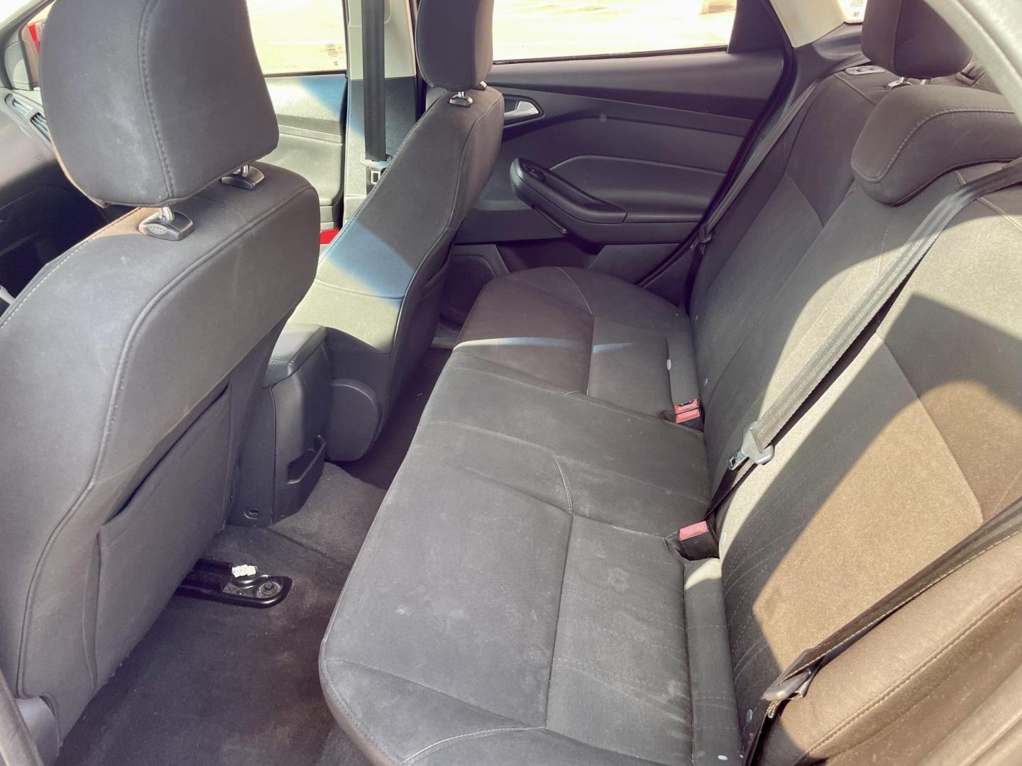 2017 Red Ford Focus SE Sedan (1FADP3F22HL) with an 2.0L L4 DOHC 16V engine, located at 5005 Telephone Rd., Houston, TX, 77087, (713) 641-0980, 29.690666, -95.298683 - Photo#4