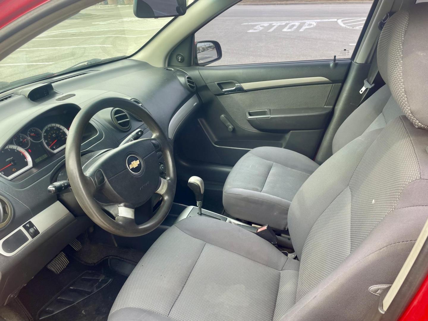 2007 Red Chevrolet Aveo LS 4-Door (KL1TD56657B) with an 2.2L L4 DOHC 16V engine, located at 5005 Telephone Rd., Houston, TX, 77087, (713) 641-0980, 29.690666, -95.298683 - Photo#4