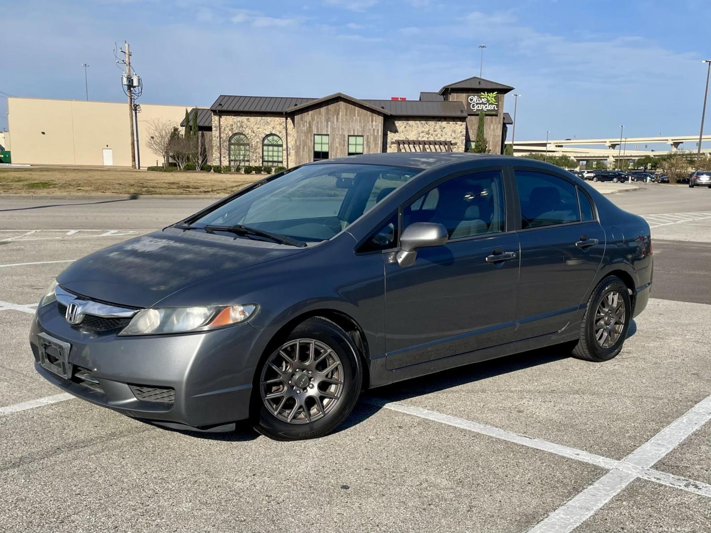 2009 Gray Honda Civic LX Sedan 5-Speed AT (19XFA16529E) with an 1.8L L4 SOHC 16V engine, 5-Speed Automatic Overdrive transmission, located at 5005 Telephone Rd., Houston, TX, 77087, (713) 641-0980, 29.690666, -95.298683 - Photo#0