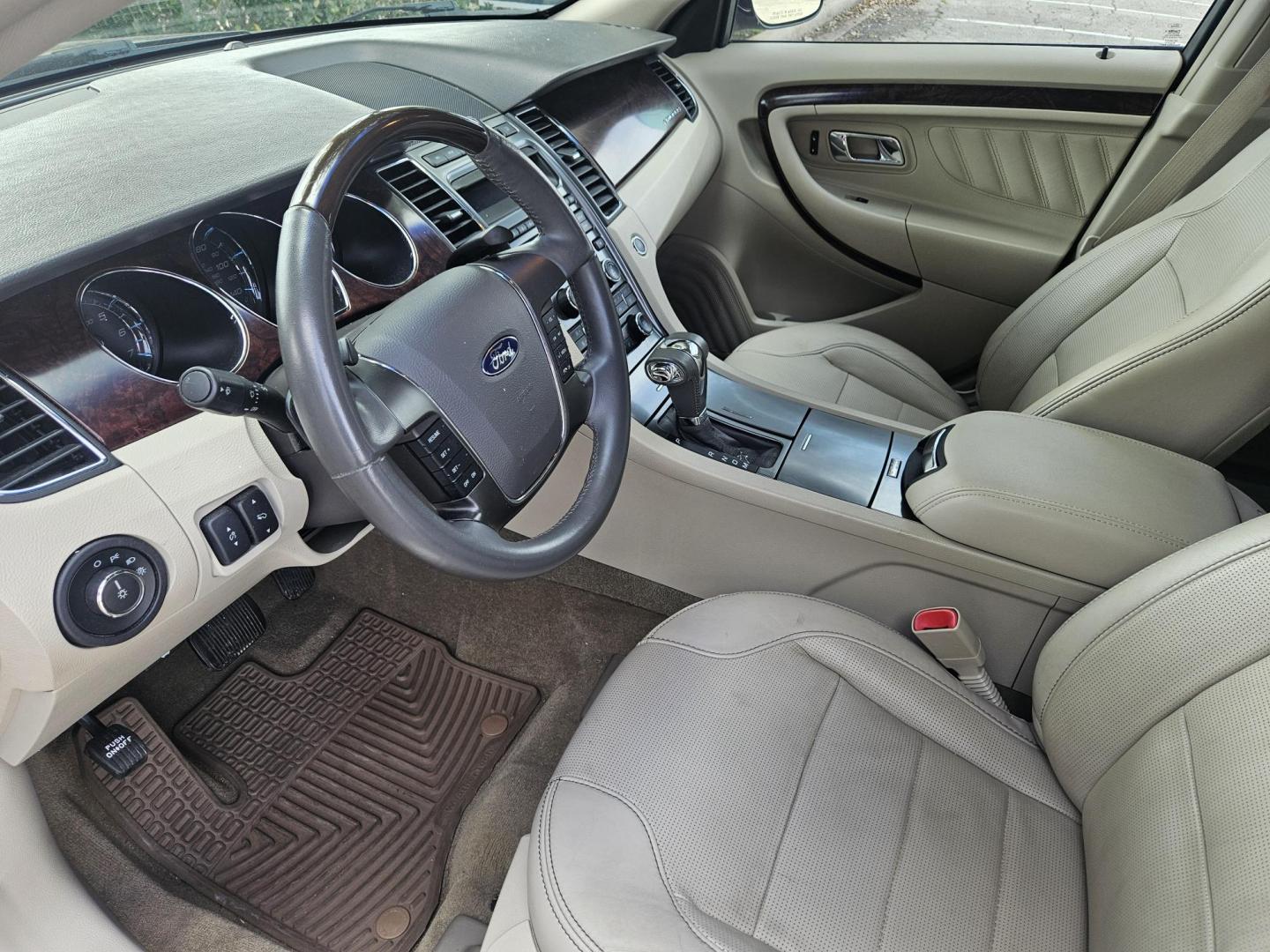 2012 Black Ford Taurus Limited AWD (1FAHP2JW1CG) with an 3.5L V6 DOHC 24V engine, 6-Speed Automatic transmission, located at 5005 Telephone Rd., Houston, TX, 77087, (713) 641-0980, 29.690666, -95.298683 - Photo#5