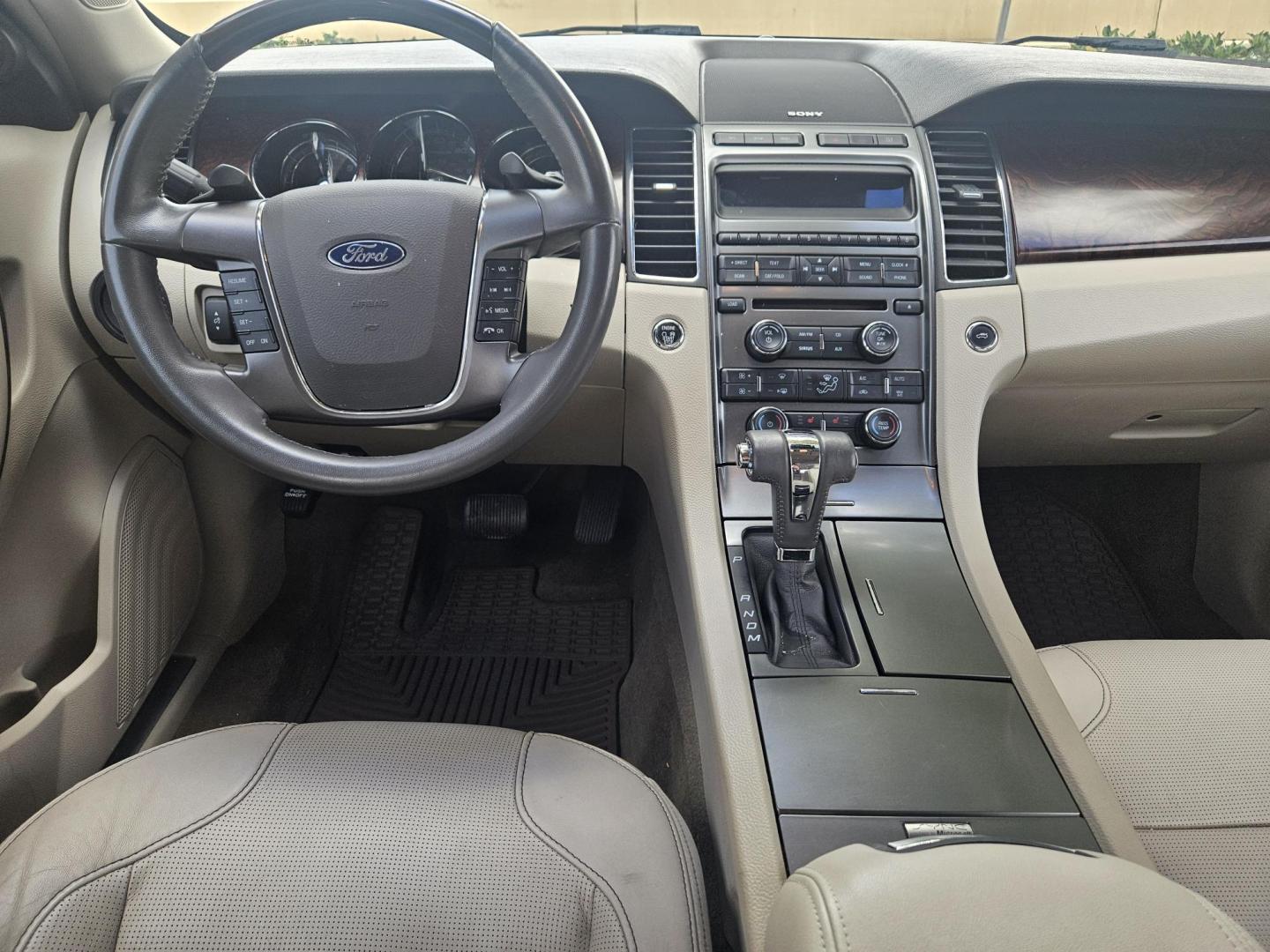 2012 Black Ford Taurus Limited AWD (1FAHP2JW1CG) with an 3.5L V6 DOHC 24V engine, 6-Speed Automatic transmission, located at 5005 Telephone Rd., Houston, TX, 77087, (713) 641-0980, 29.690666, -95.298683 - Photo#7