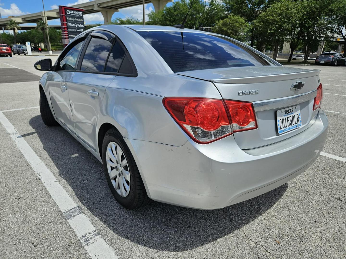 2013 silver Chevrolet Cruze LS Auto (1G1PA5SH3D7) with an 1.8L L4 DOHC 16V FFV engine, 6-Speed Automatic transmission, located at 5005 Telephone Rd., Houston, TX, 77087, (713) 641-0980, 29.690666, -95.298683 - Photo#1