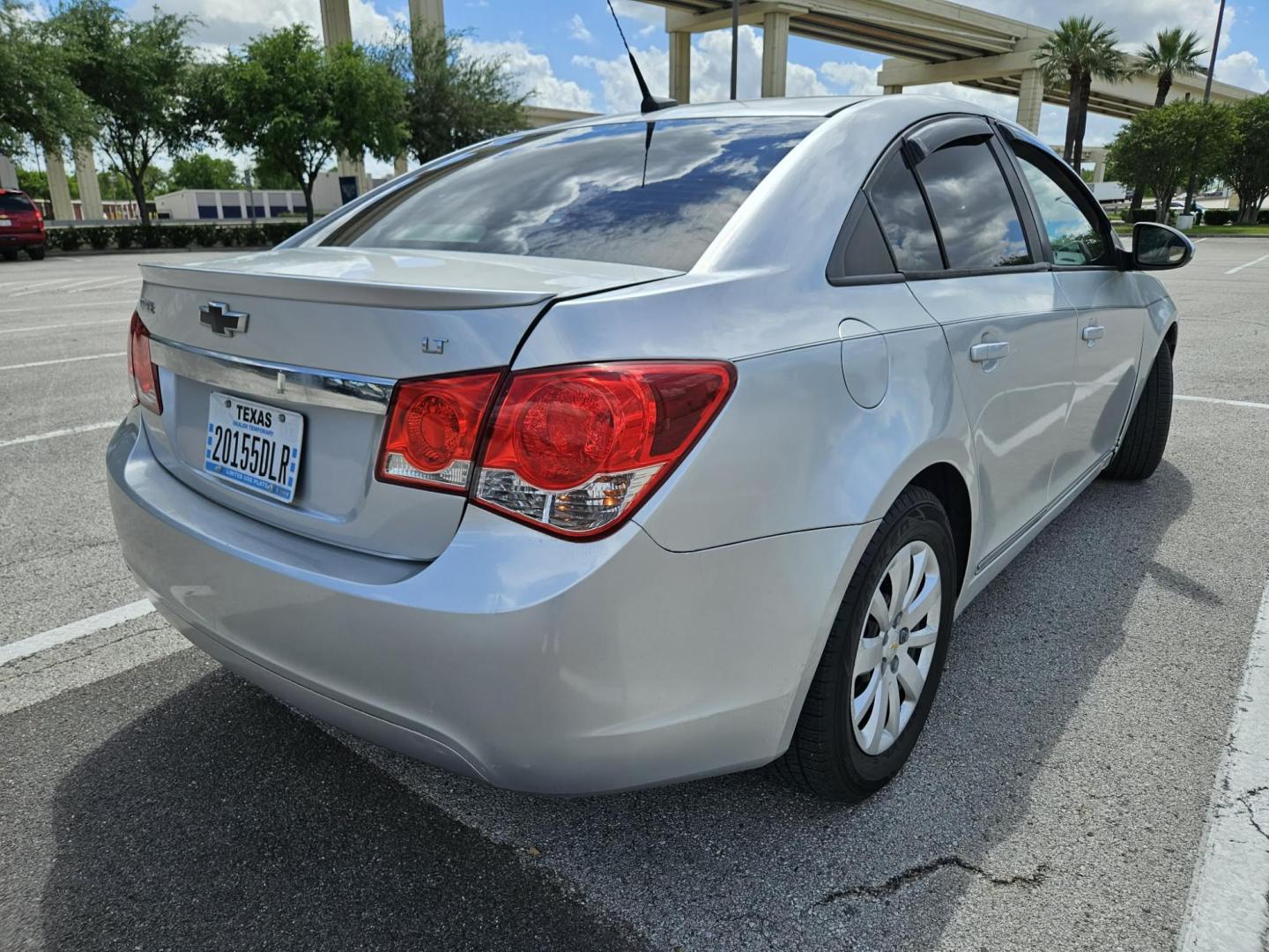 2013 silver Chevrolet Cruze LS Auto (1G1PA5SH3D7) with an 1.8L L4 DOHC 16V FFV engine, 6-Speed Automatic transmission, located at 5005 Telephone Rd., Houston, TX, 77087, (713) 641-0980, 29.690666, -95.298683 - Photo#2