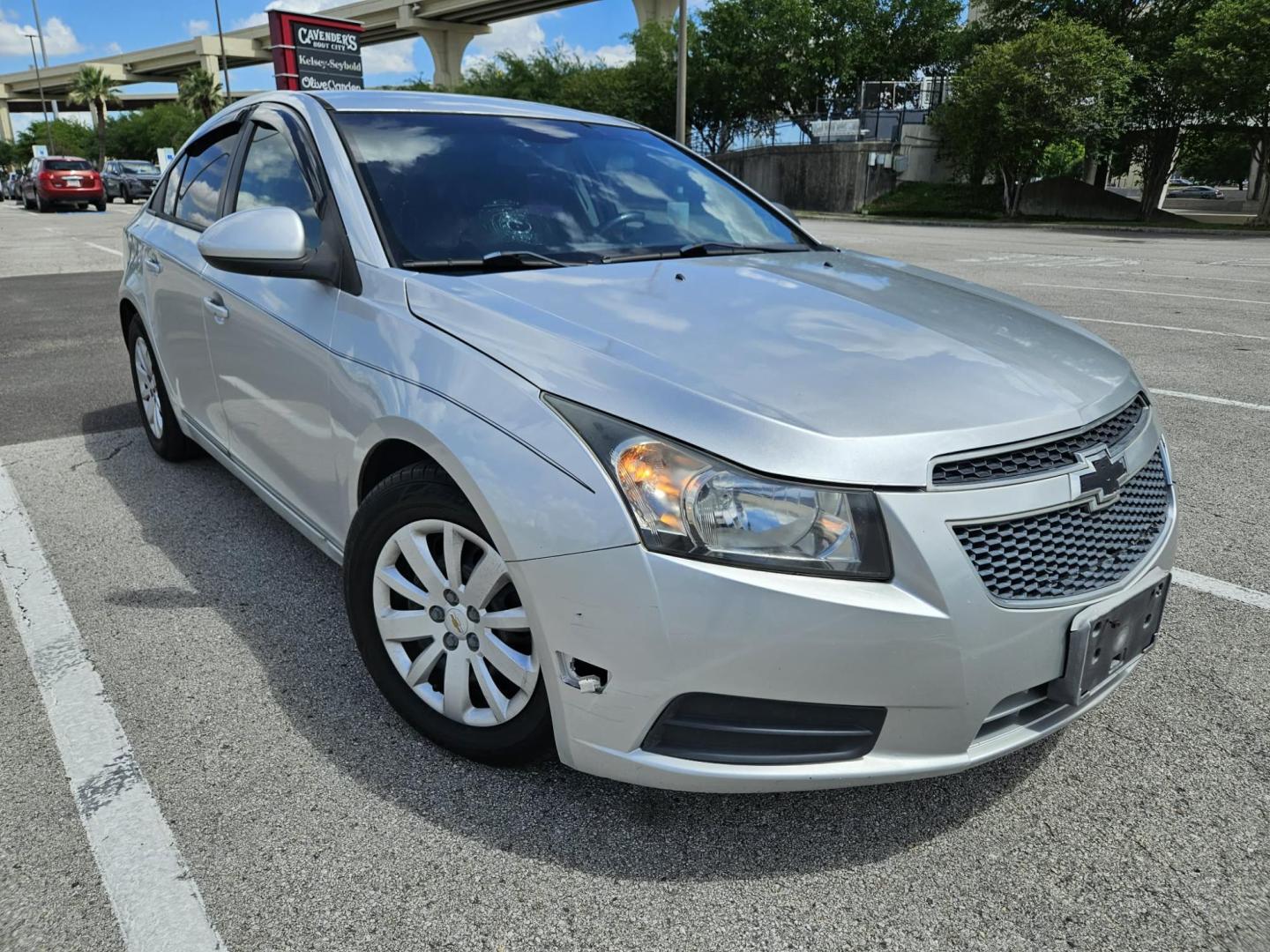 2013 silver Chevrolet Cruze LS Auto (1G1PA5SH3D7) with an 1.8L L4 DOHC 16V FFV engine, 6-Speed Automatic transmission, located at 5005 Telephone Rd., Houston, TX, 77087, (713) 641-0980, 29.690666, -95.298683 - Photo#3