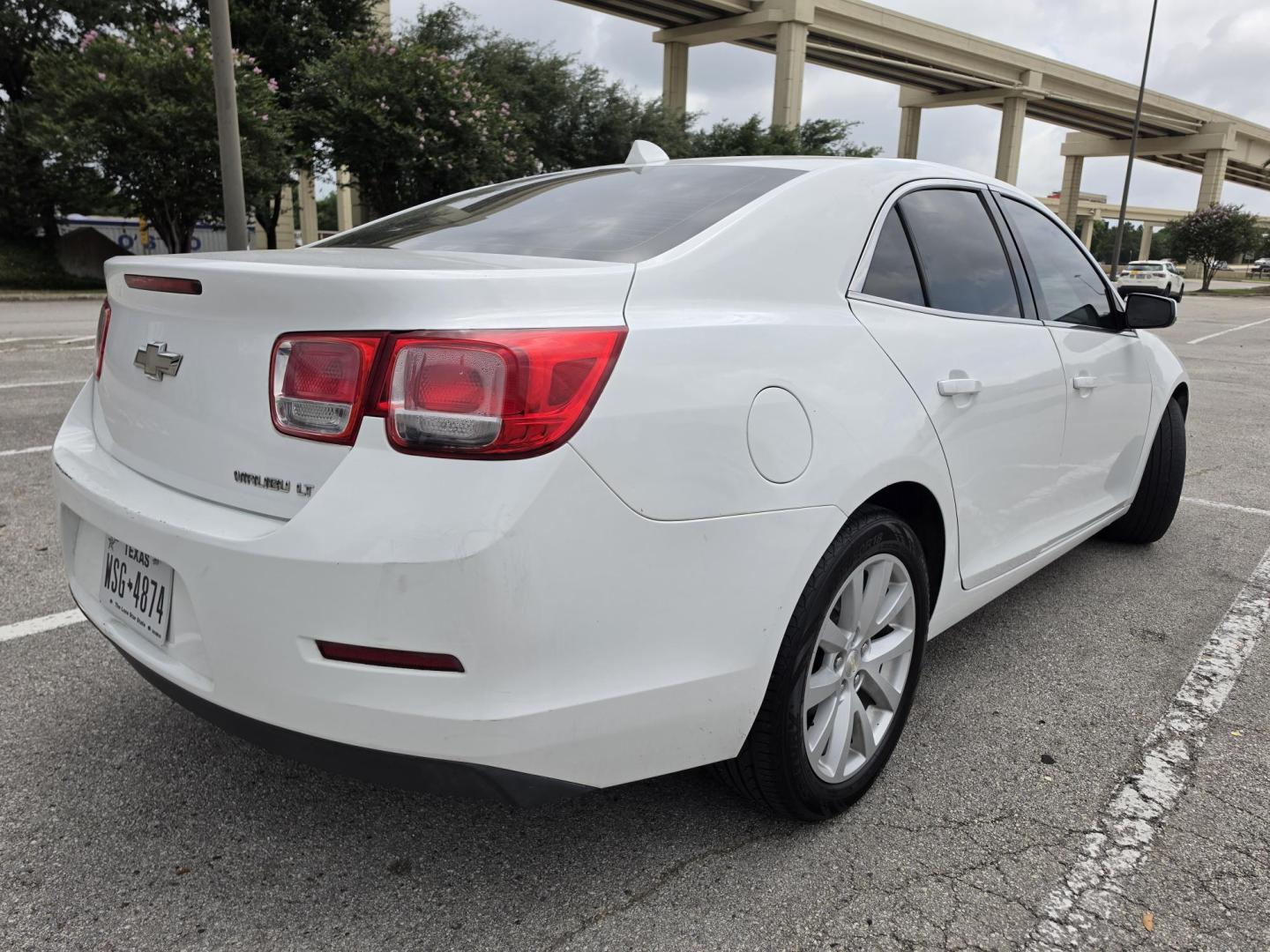 2014 white Chevrolet Malibu 2LT (1G11E5SL5EF) with an 2.5L L4 DOHC 16V engine, 6-Speed Automatic transmission, located at 5005 Telephone Rd., Houston, TX, 77087, (713) 641-0980, 29.690666, -95.298683 - Photo#1