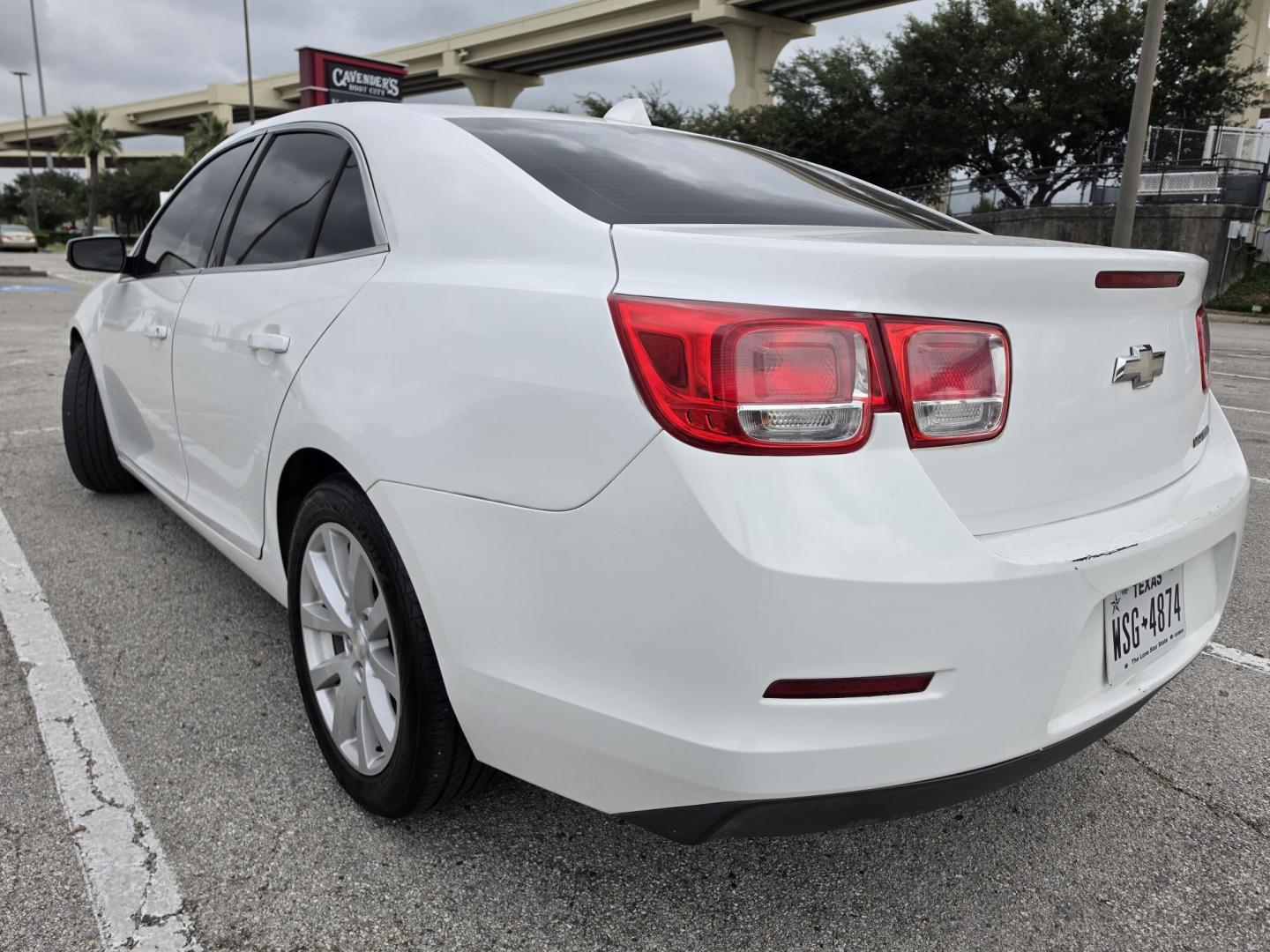 2014 white Chevrolet Malibu 2LT (1G11E5SL5EF) with an 2.5L L4 DOHC 16V engine, 6-Speed Automatic transmission, located at 5005 Telephone Rd., Houston, TX, 77087, (713) 641-0980, 29.690666, -95.298683 - Photo#2