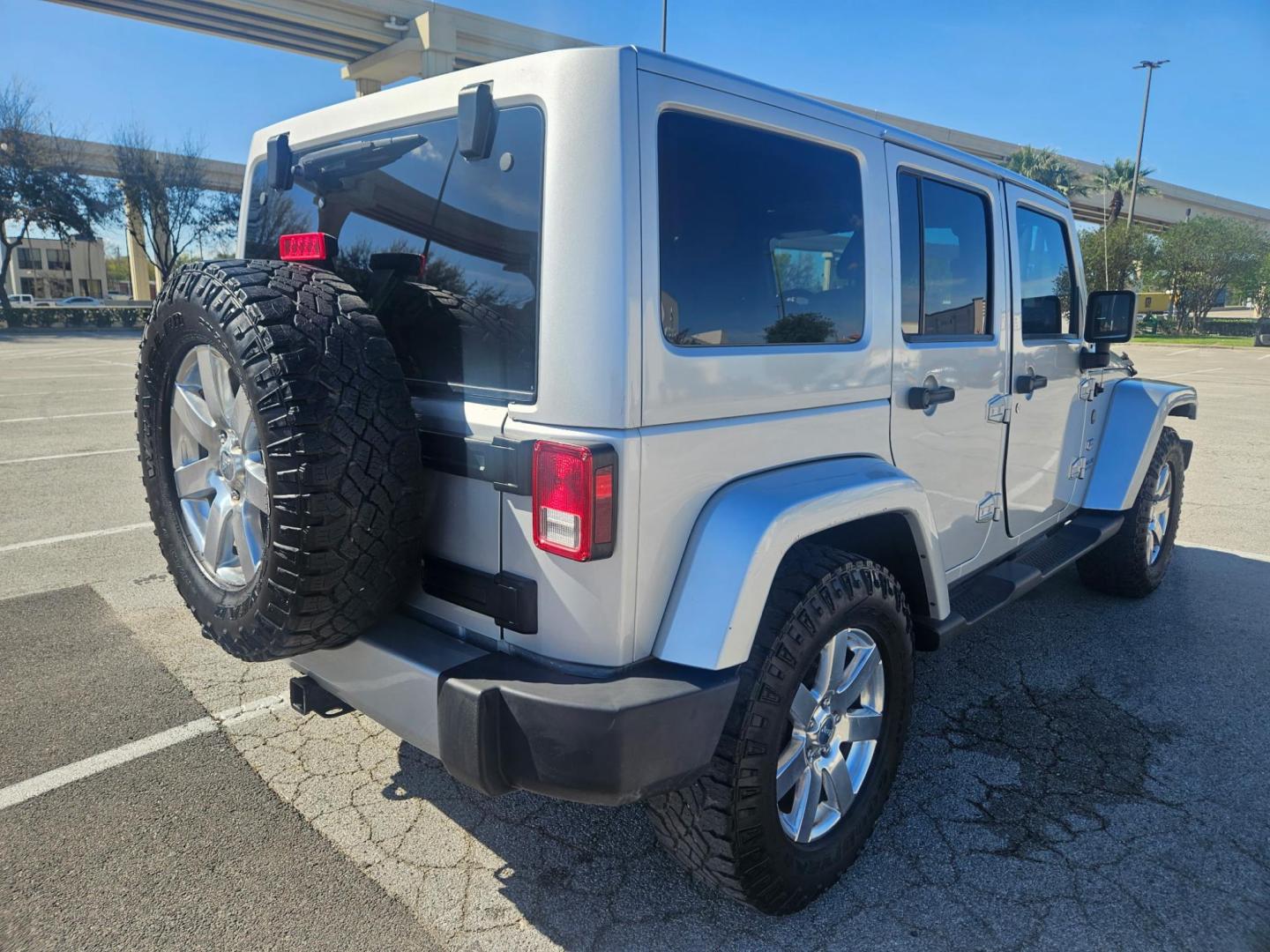2011 silver Jeep Wrangler Jeep 70th Anniversary (1J4BA7H18BL) with an 3.8L V6 OHV 12V engine, located at 5005 Telephone Rd., Houston, TX, 77087, (713) 641-0980, 29.690666, -95.298683 - Photo#2