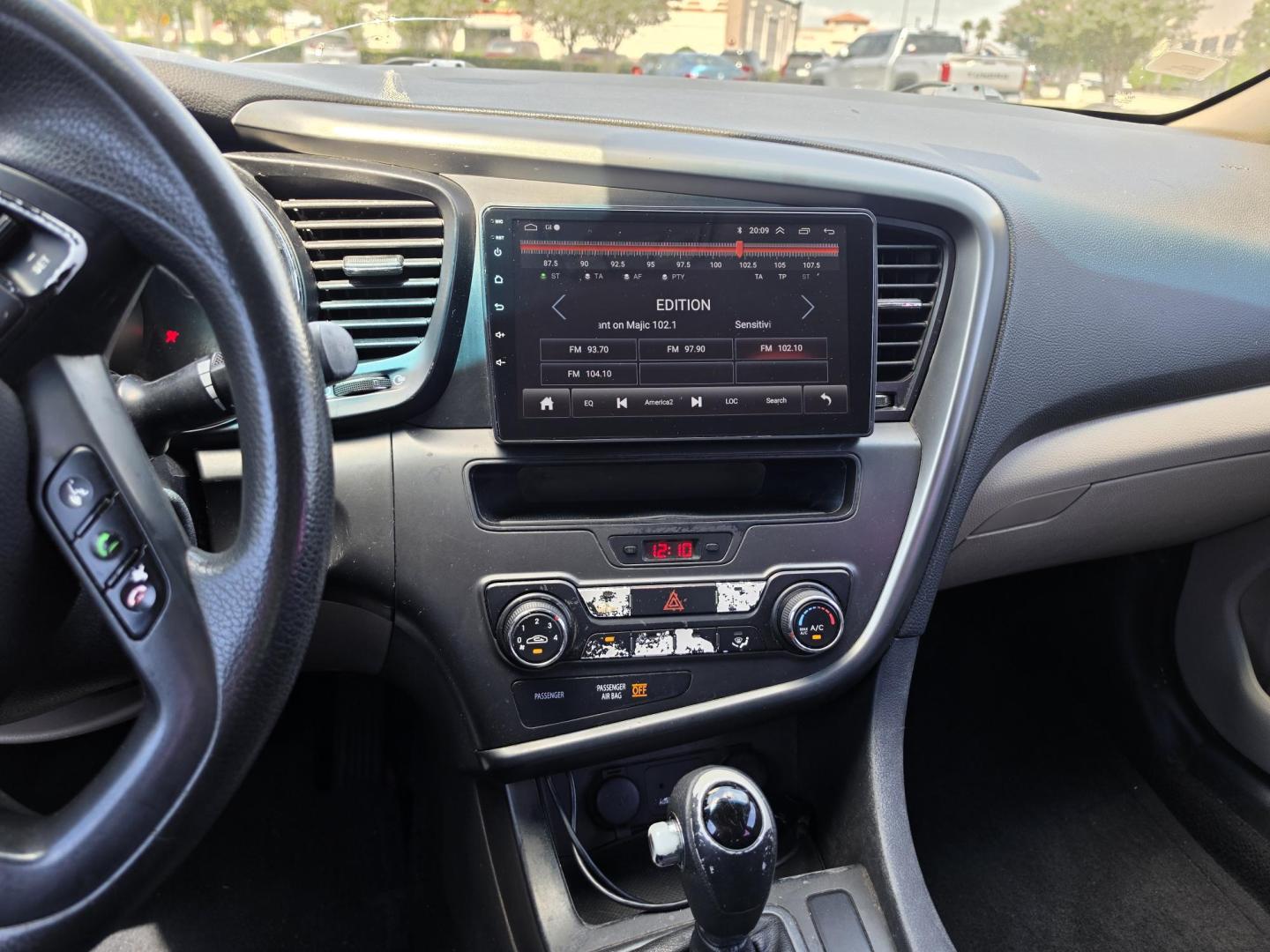 2013 Red Kia Optima LX MT (5XXGM4A79DG) with an 2.4L L4 DOHC 16V engine, 5-Speed Manual transmission, located at 5005 Telephone Rd., Houston, TX, 77087, (713) 641-0980, 29.690666, -95.298683- Photo#5